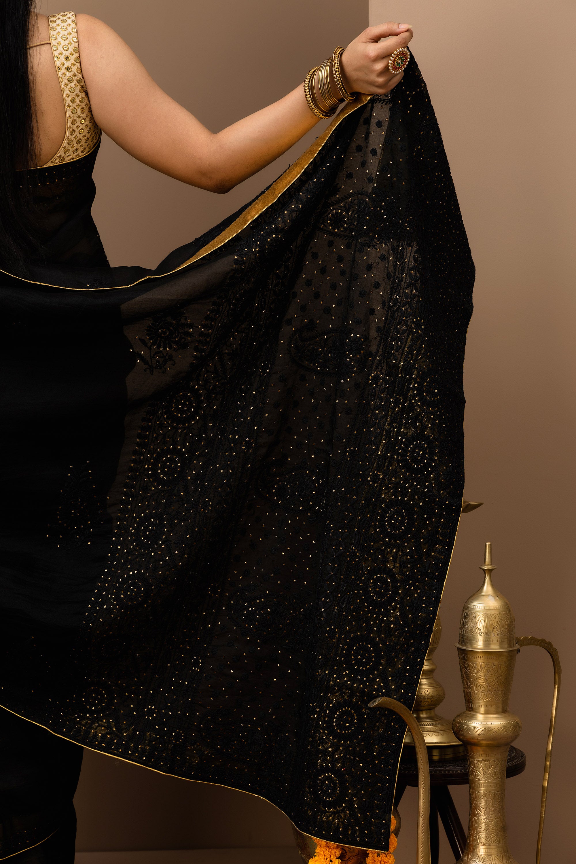 Black, pure organza silk, hand embroidered Chikankari with mukaish work saree