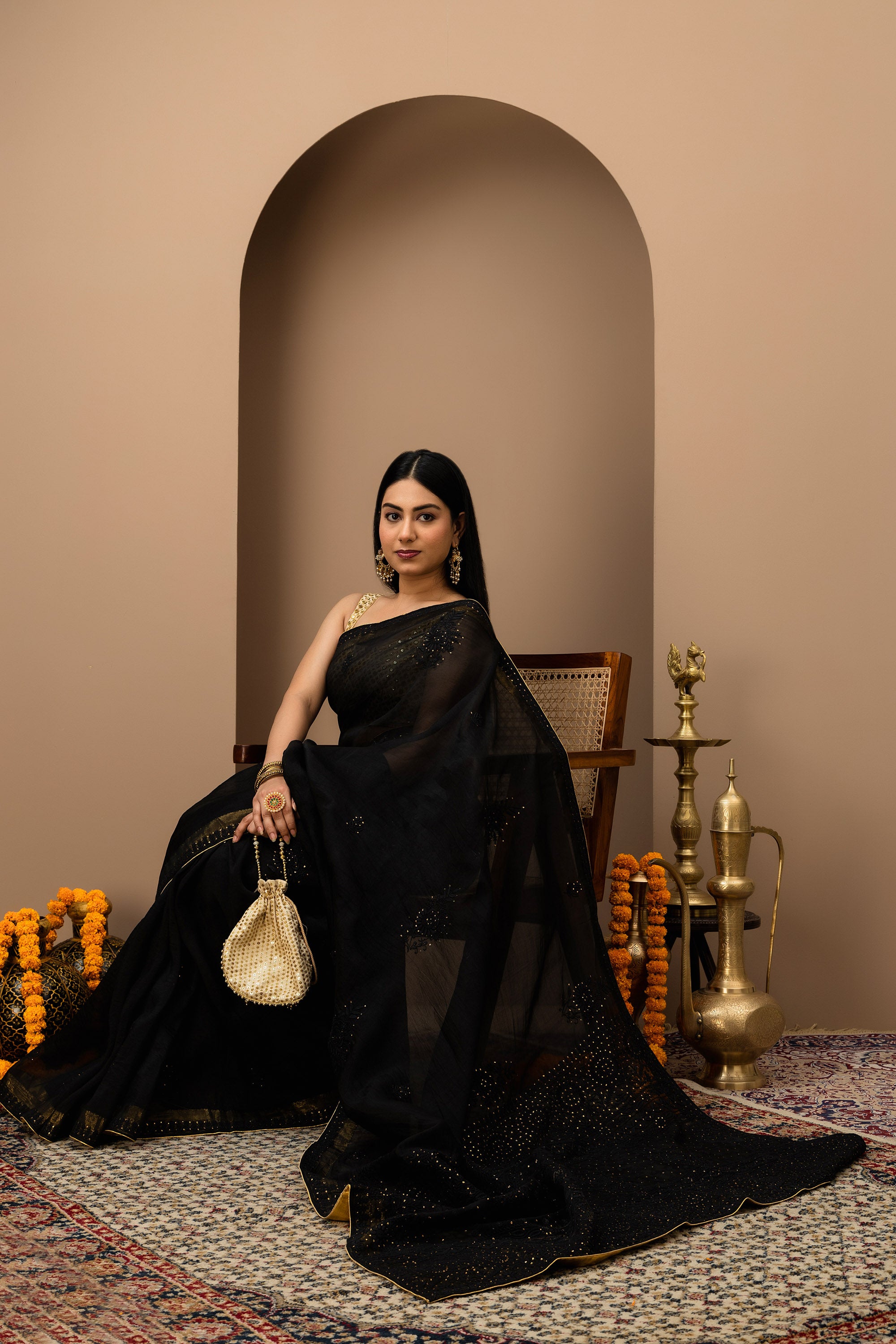 Black, pure organza silk, hand embroidered Chikankari with mukaish work saree