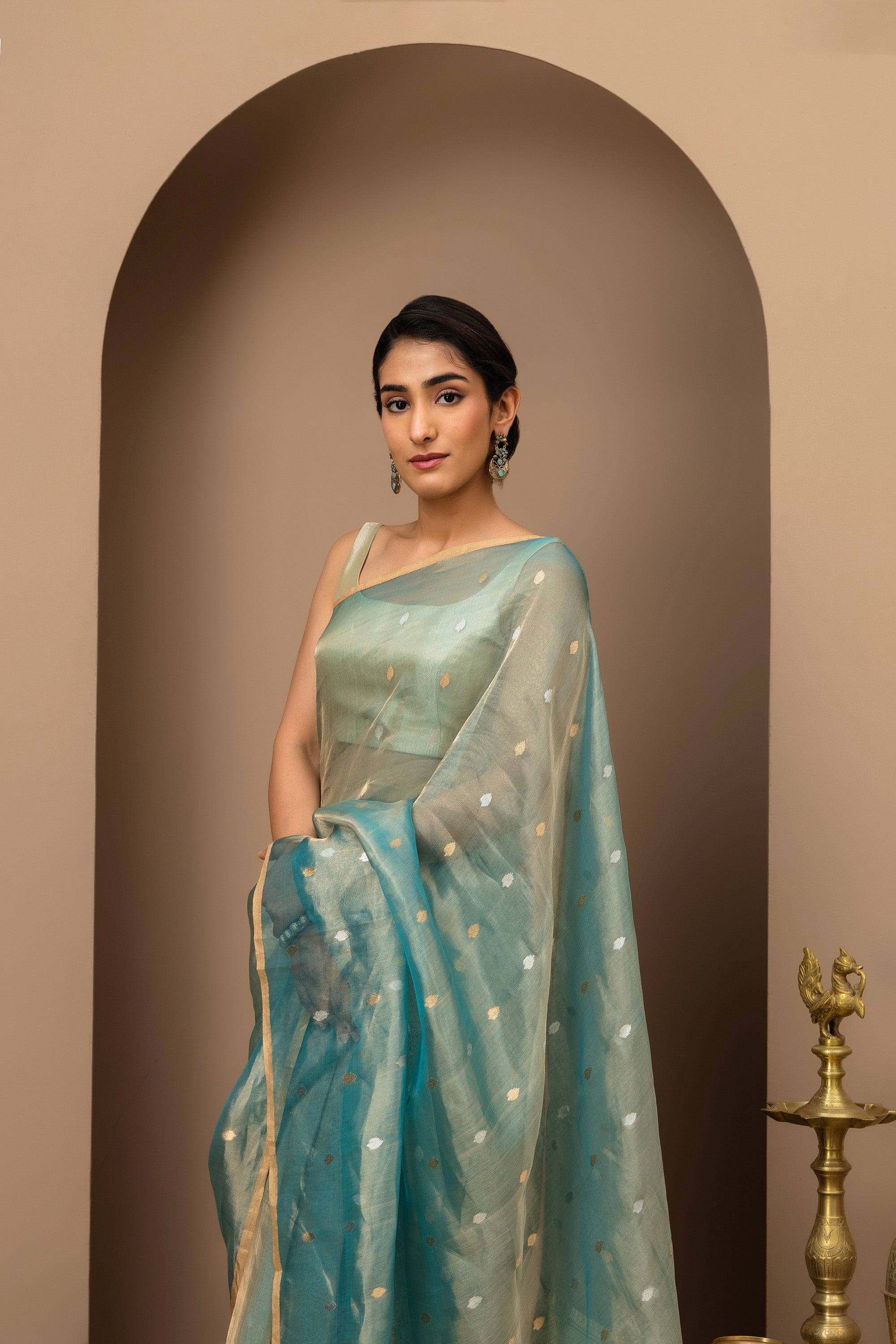 Beautiful blue-green Handwoven Tissue Silk Saree with Zari Border