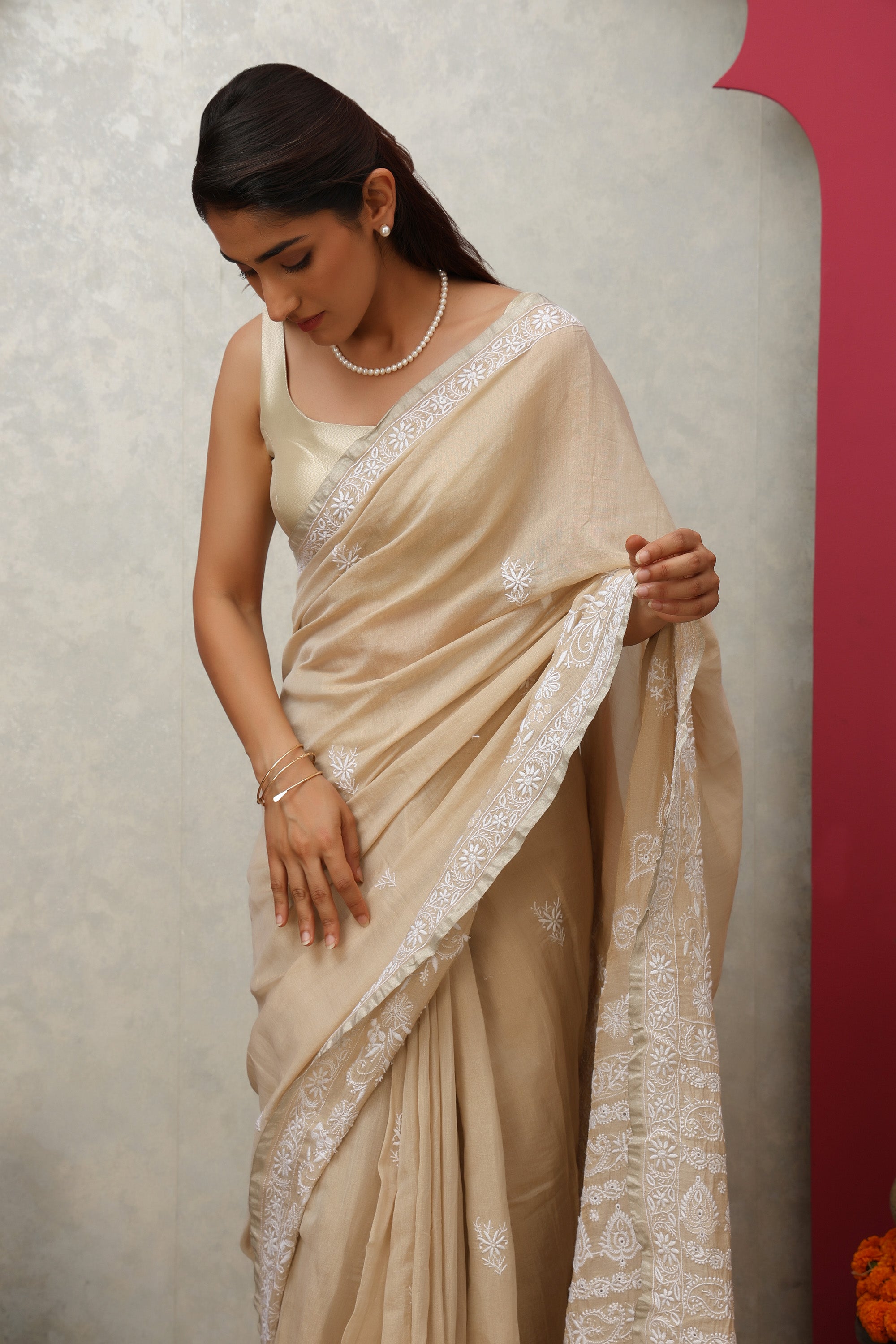Shimmering beige pure silk tissue fine hand embroidered Chikankari saree