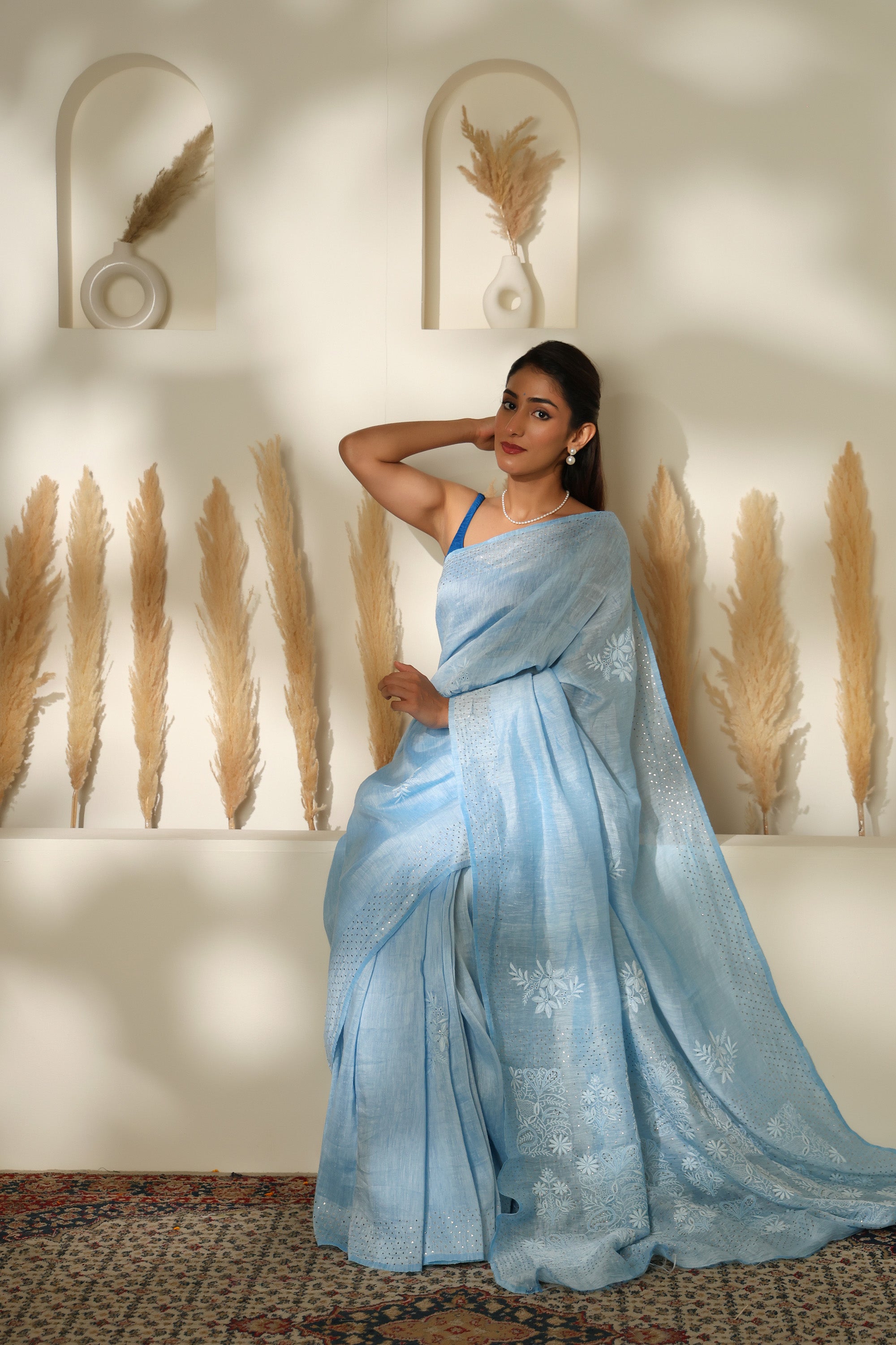 Stunning Powder Blue linen hand embroidered Chikankari saree