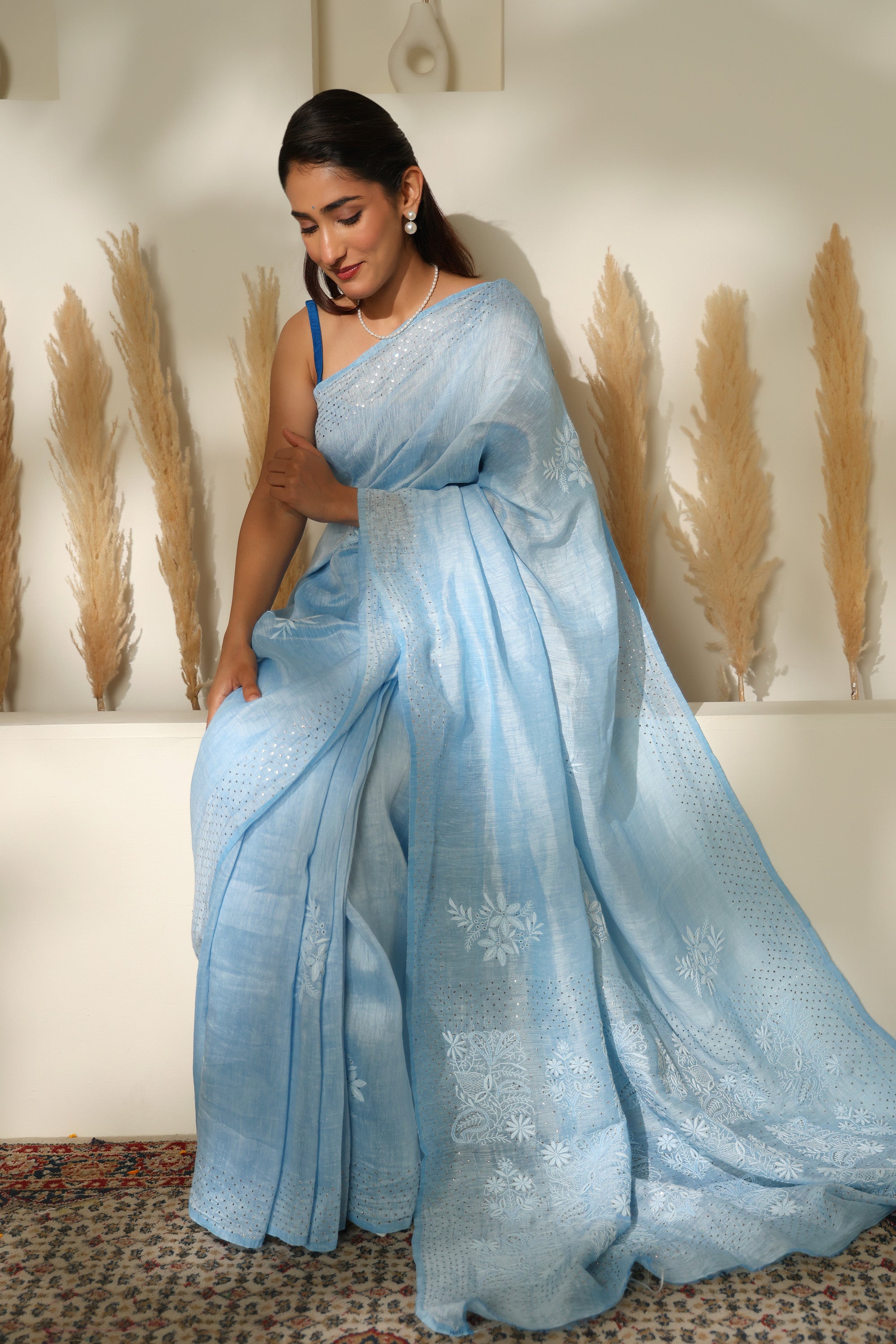 Stunning Powder Blue linen hand embroidered Chikankari saree