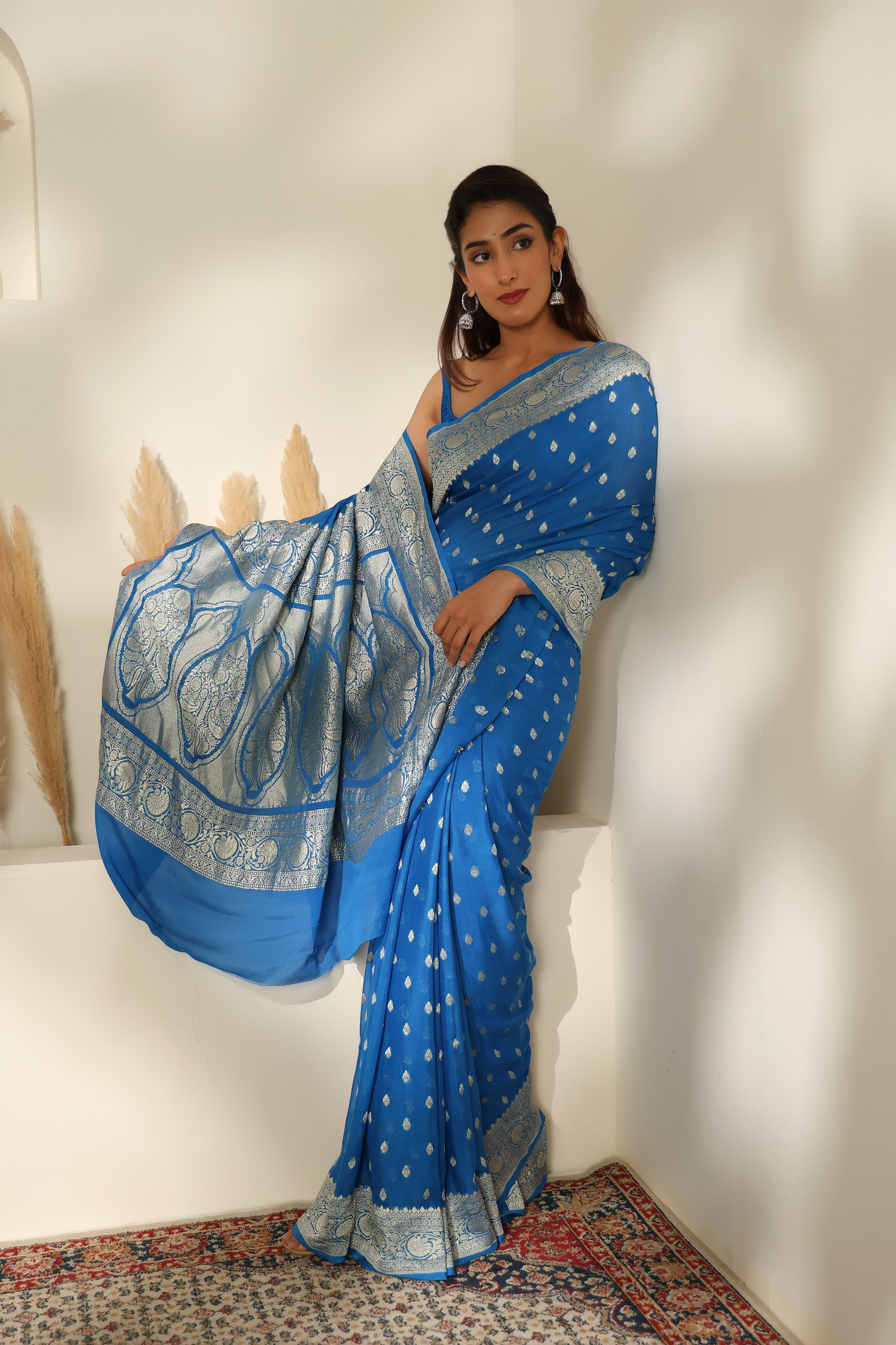 Sapphire Blue handwoven pure khadi georgette saree with silver Zari border
