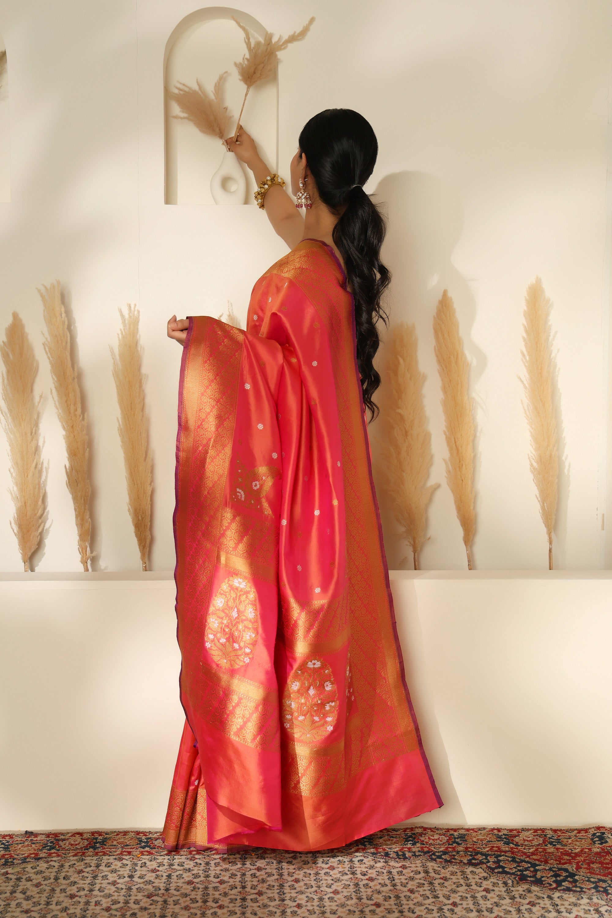 Stunning vibrant coral pink pure katan silk saree