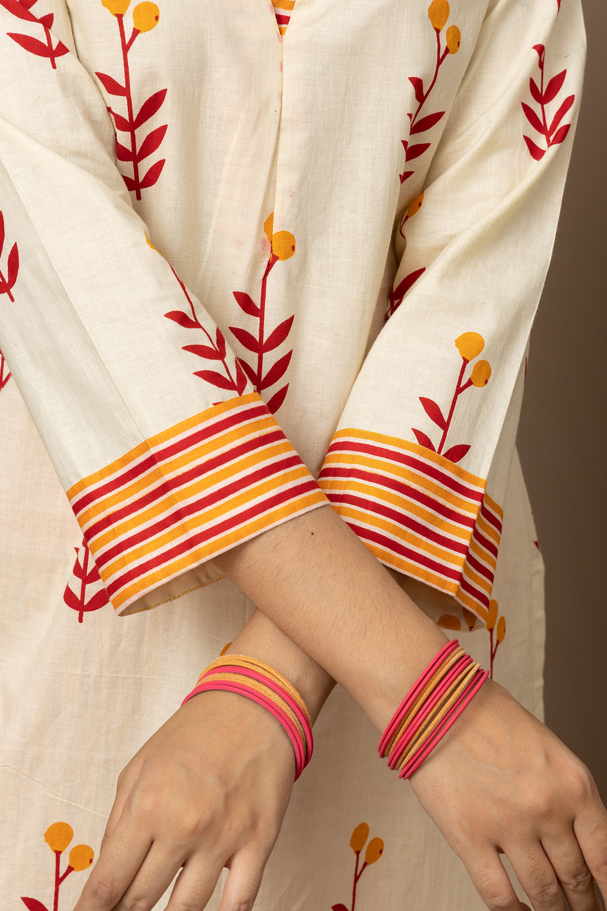 Kesar Bloom - Cotton kurta with pants in cream colour with orange-red floral screen print