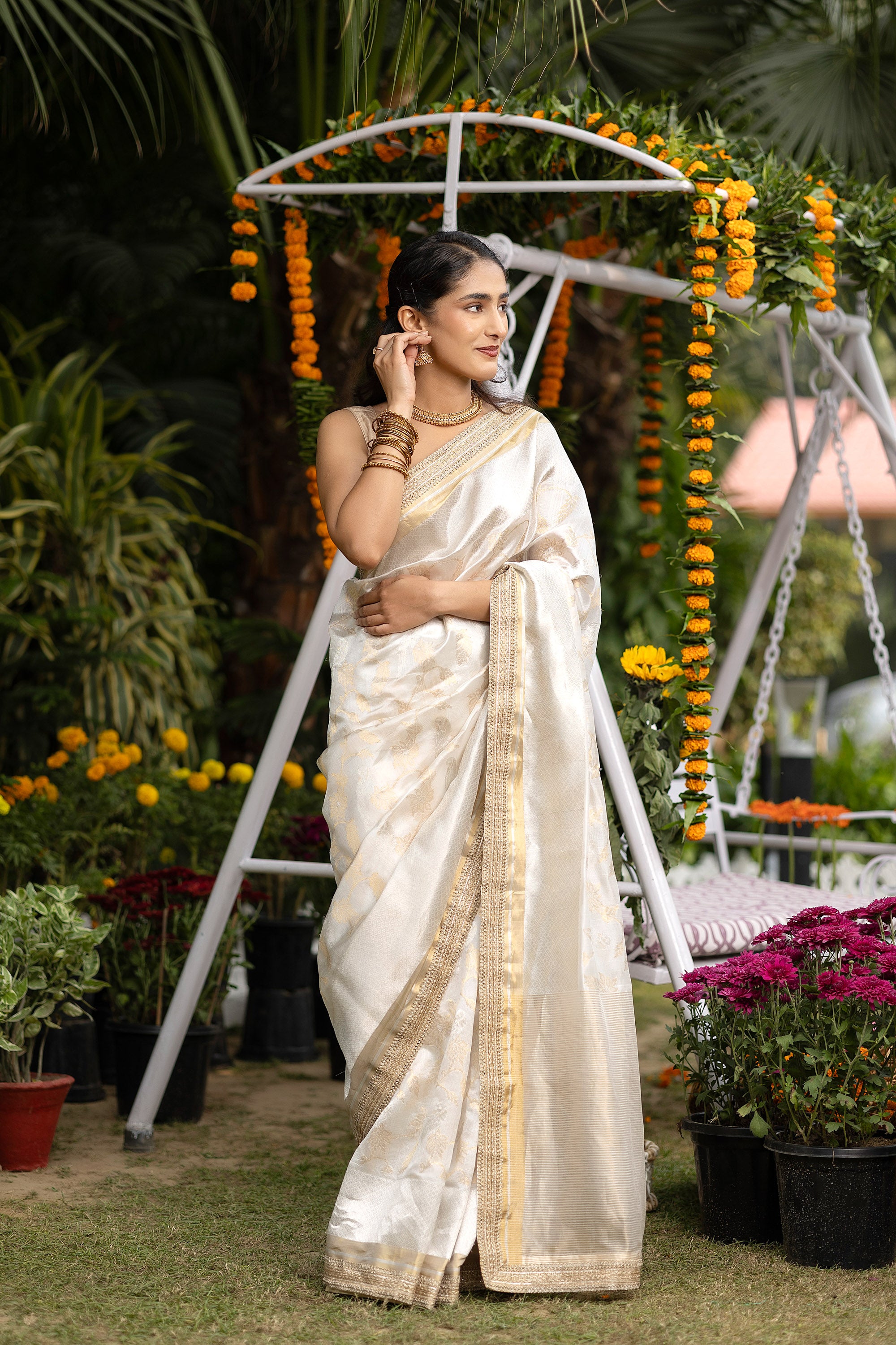 Chanderi handwoven pure silk white saree with all-over golden and silver zari weaved design