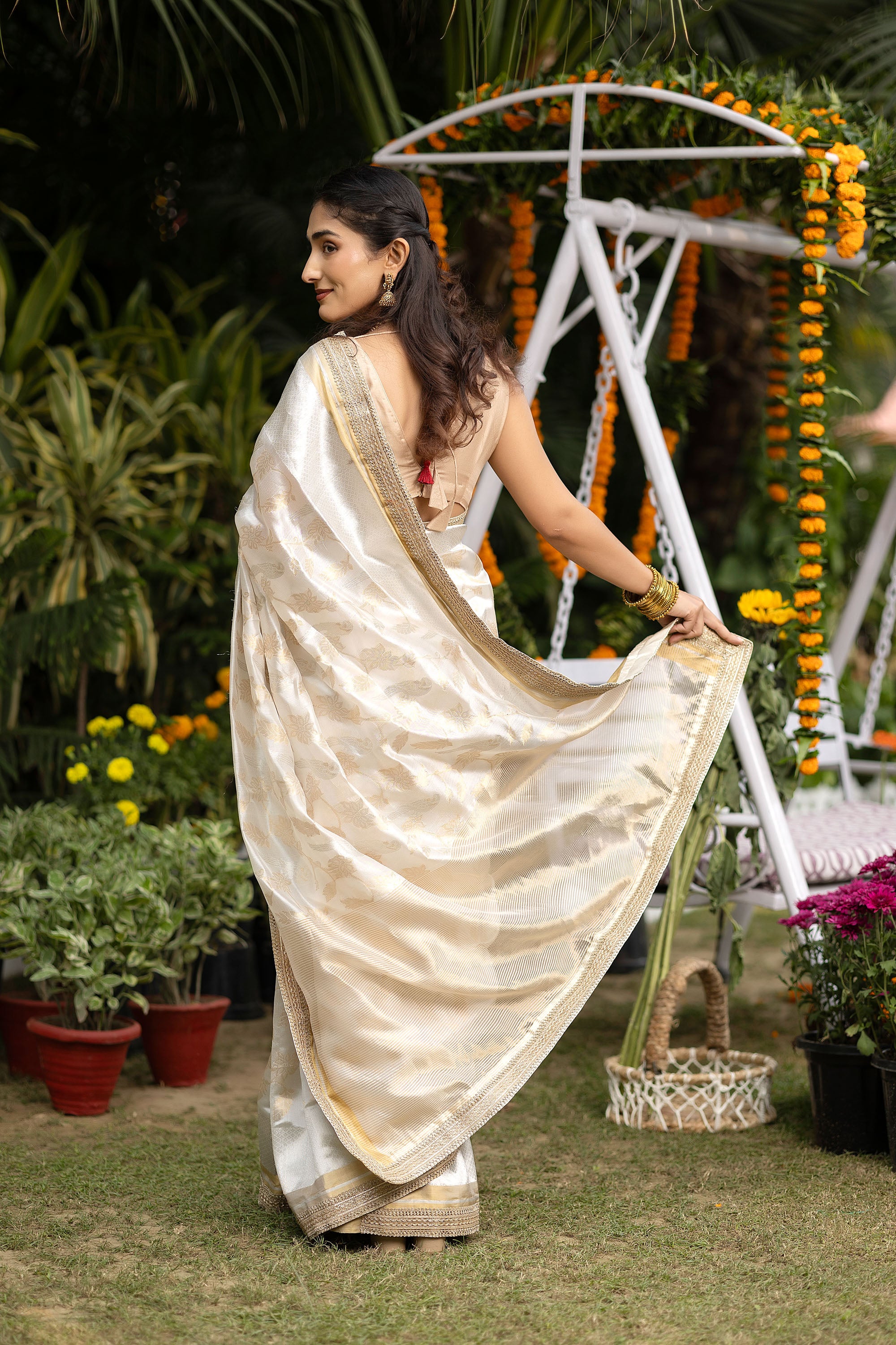 Chanderi handwoven pure silk white saree with all-over golden and silver zari weaved design