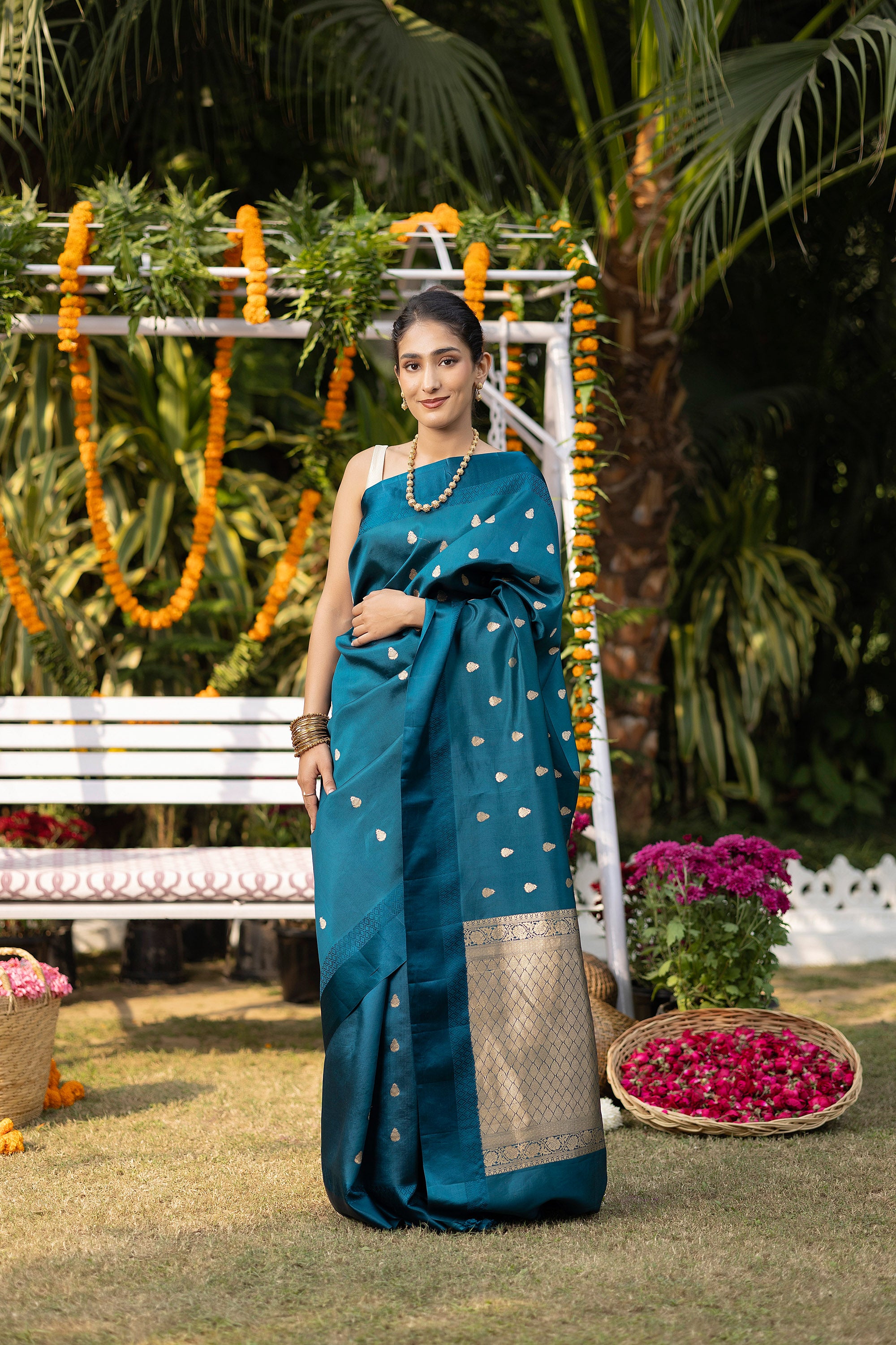 Banarasi handloom teal blue pure silk saree with small zari Buti and zari pallu