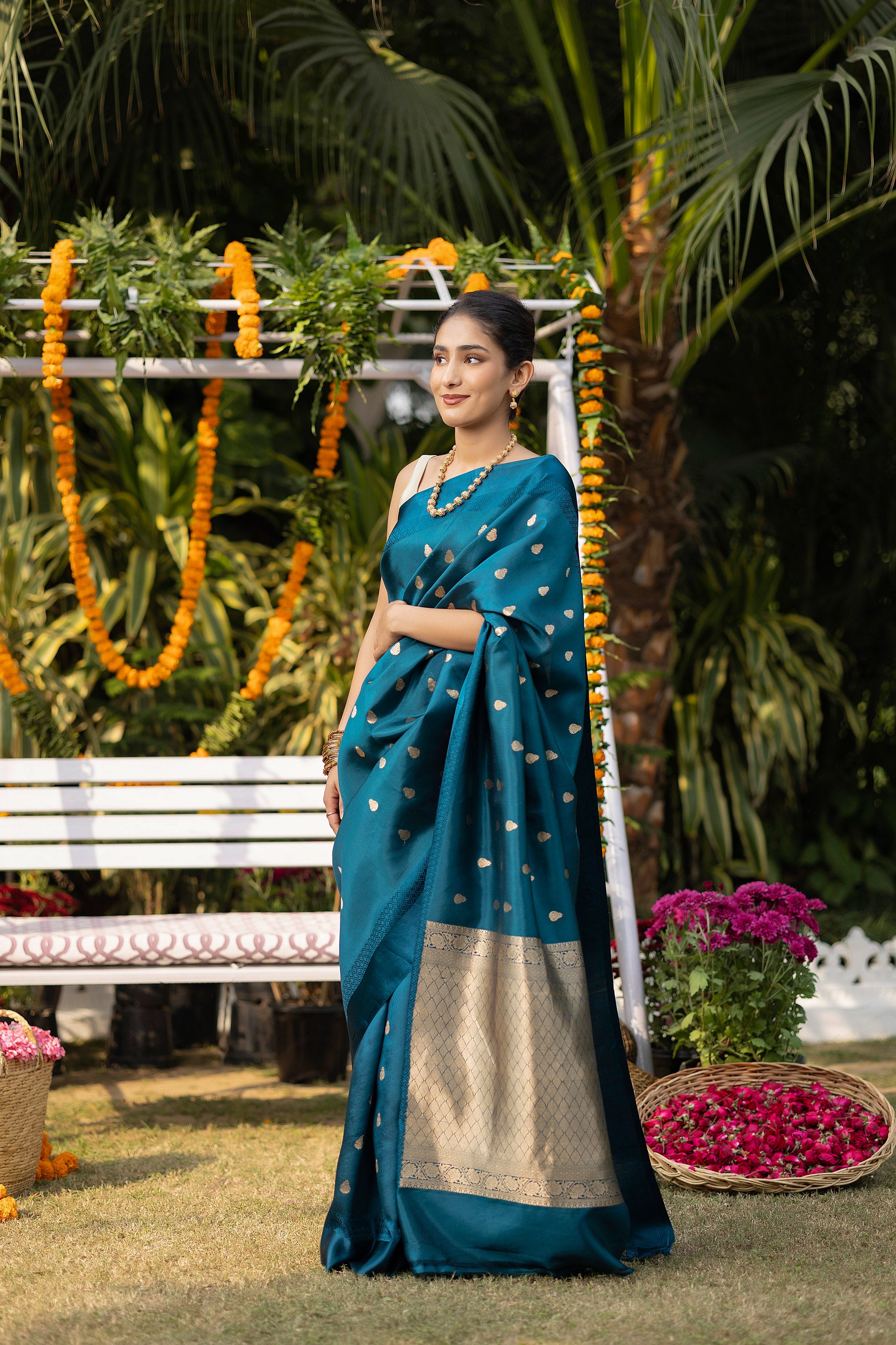 Banarasi handloom teal blue pure silk saree with small zari Buti and zari pallu