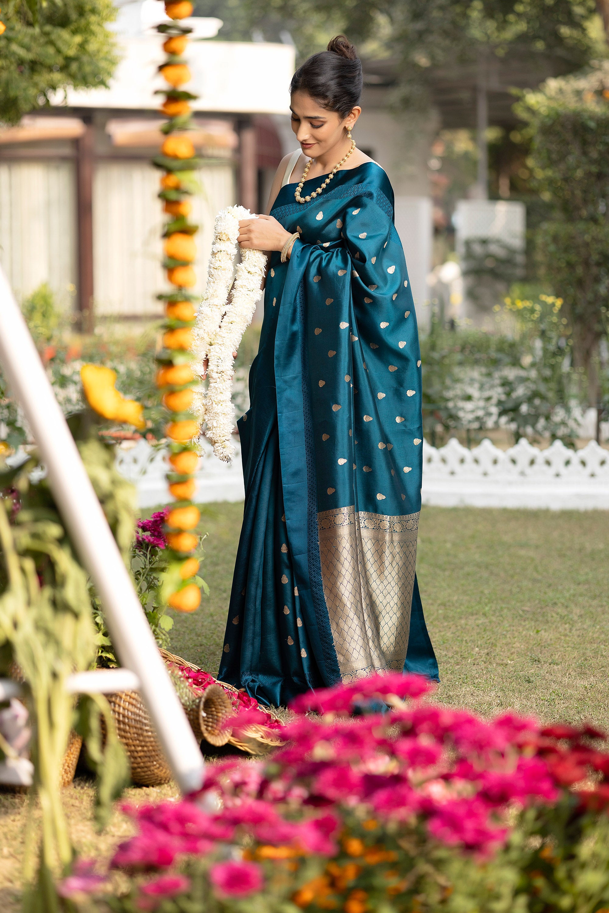 Banarasi handloom teal blue pure silk saree with small zari Buti and zari pallu