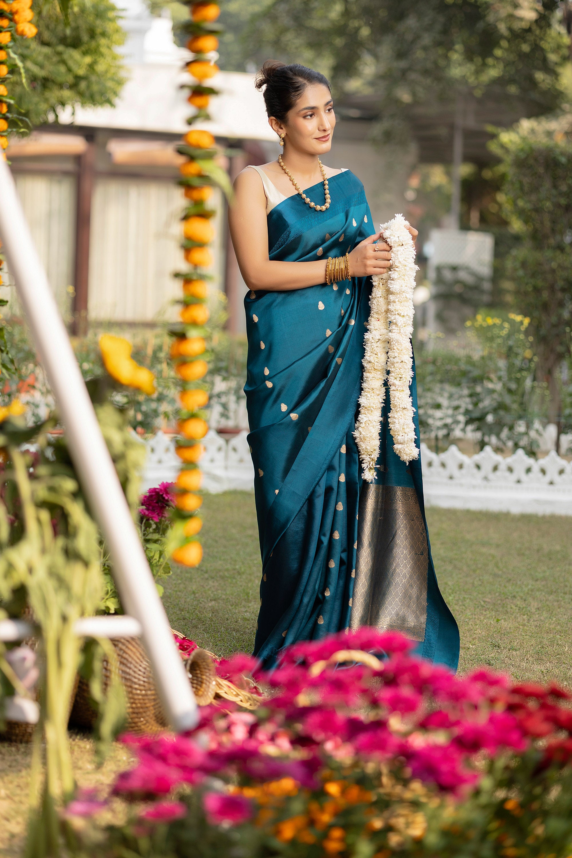 Banarasi handloom teal blue pure silk saree with small zari Buti and zari pallu