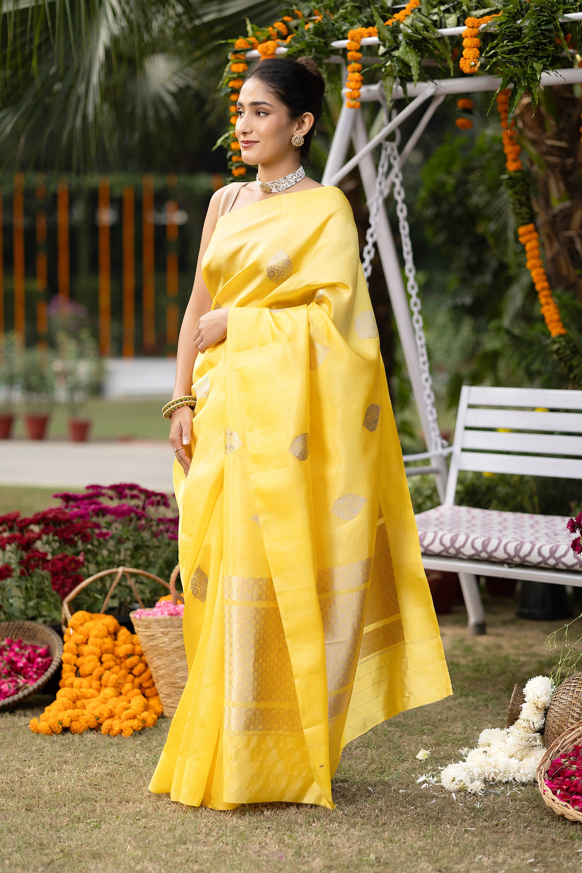 Banarasi handloom yellow pure silk saree with large zari Buti and zari pallu