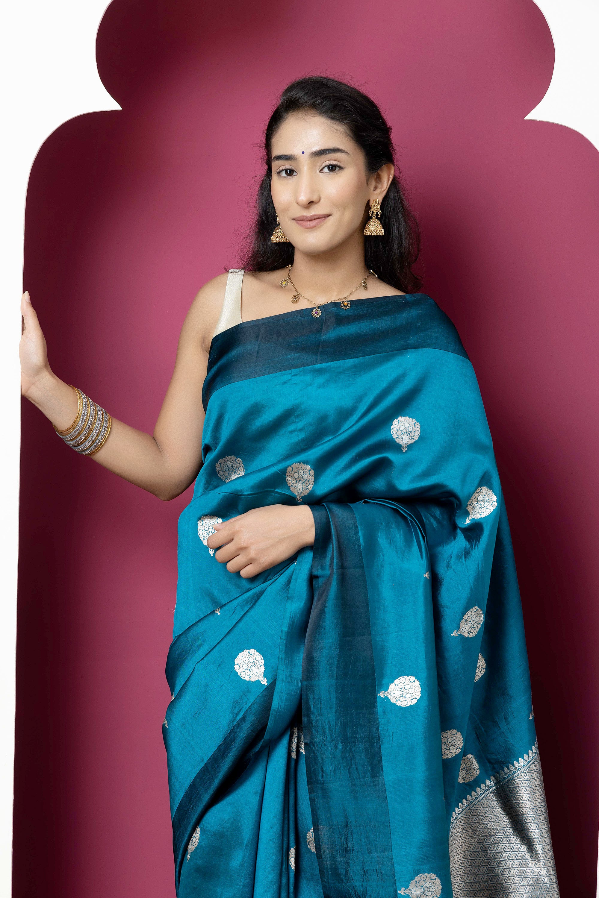 Banarasi Handloom teal blue pure silk saree with large bute and zari border