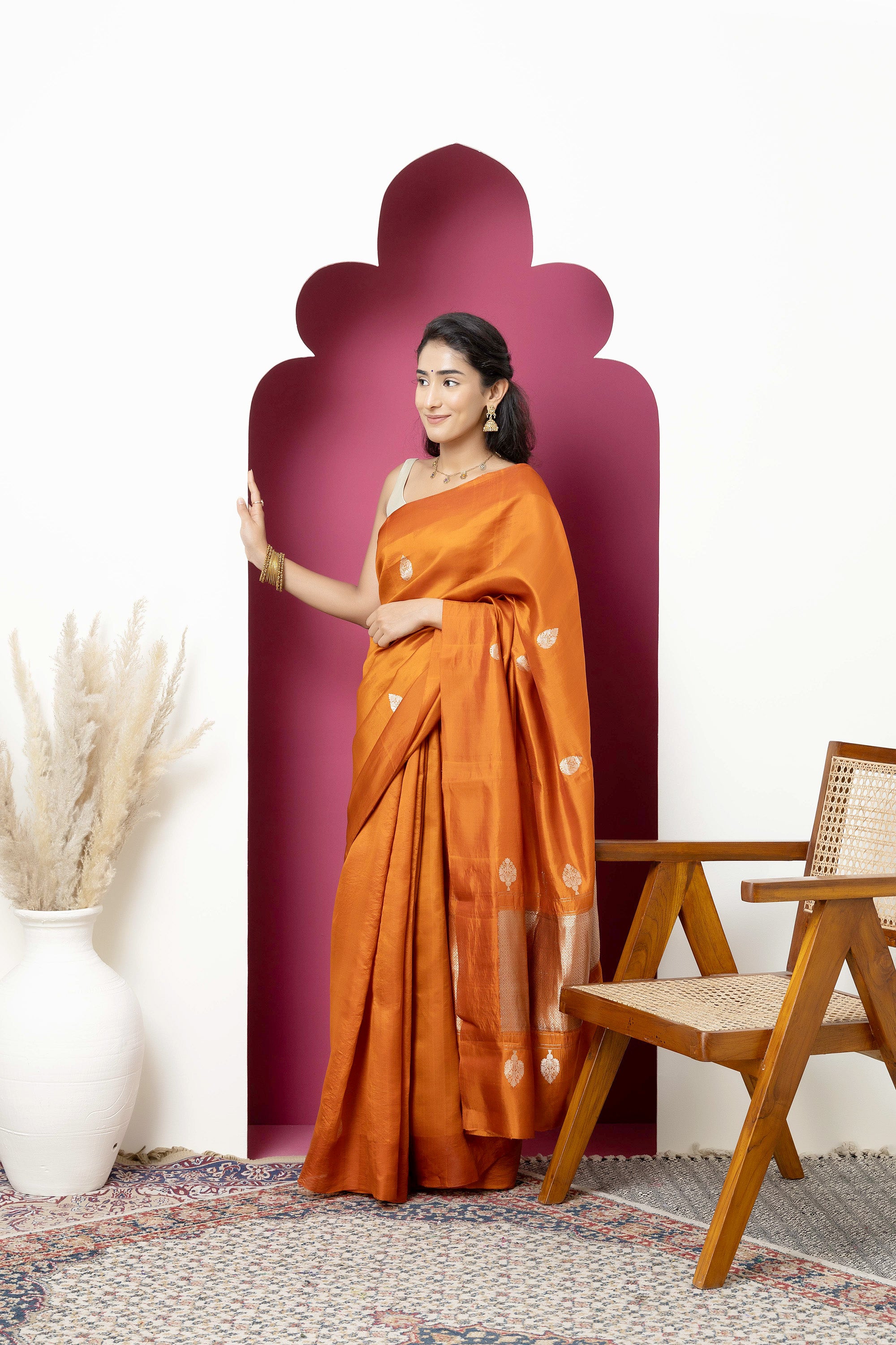 Banarasi Handloom rust yellow pure silk saree with large bute and zari border