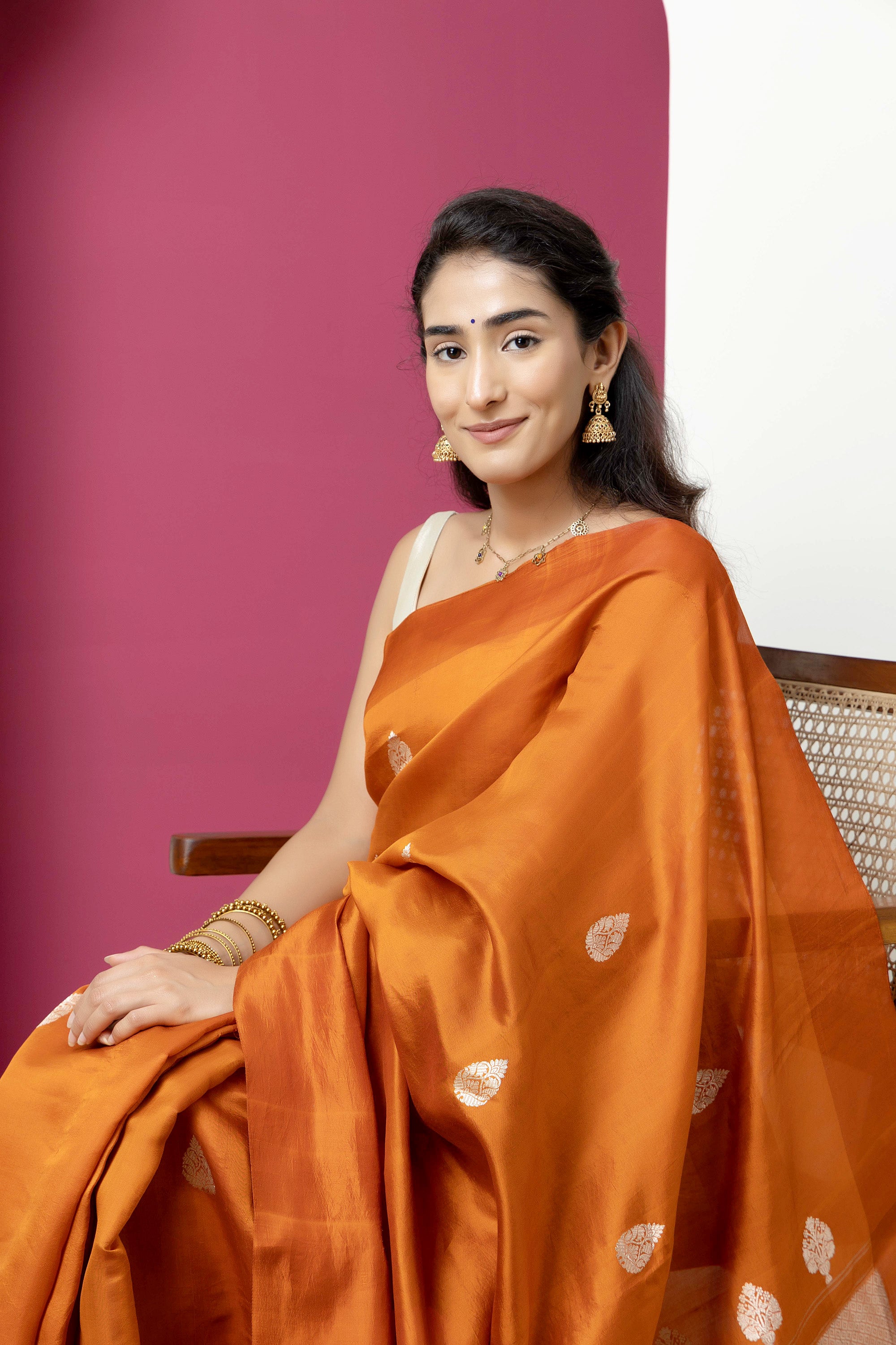 Banarasi Handloom rust yellow pure silk saree with large bute and zari border