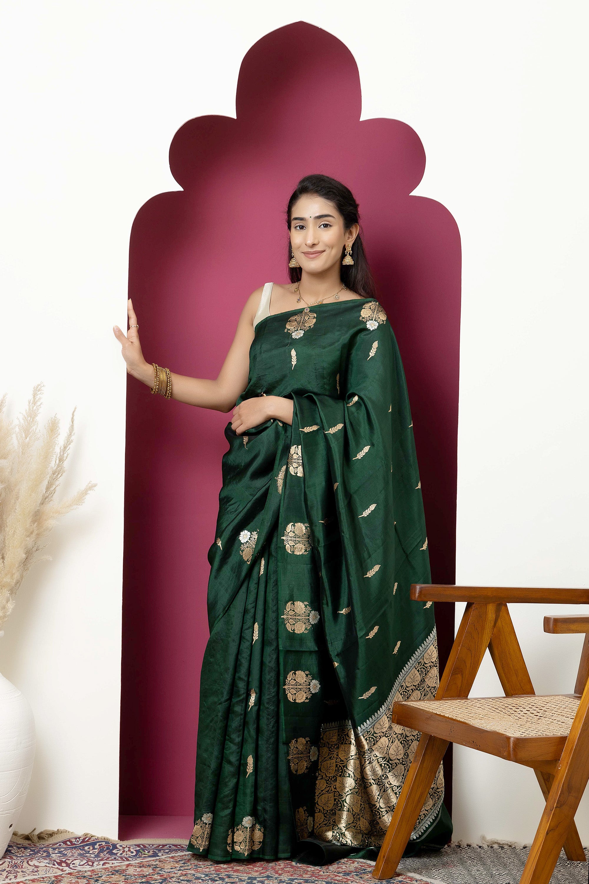 Banarasi Handloom deep bottle green pure silk saree with large bute on the border, bute all over and zari border