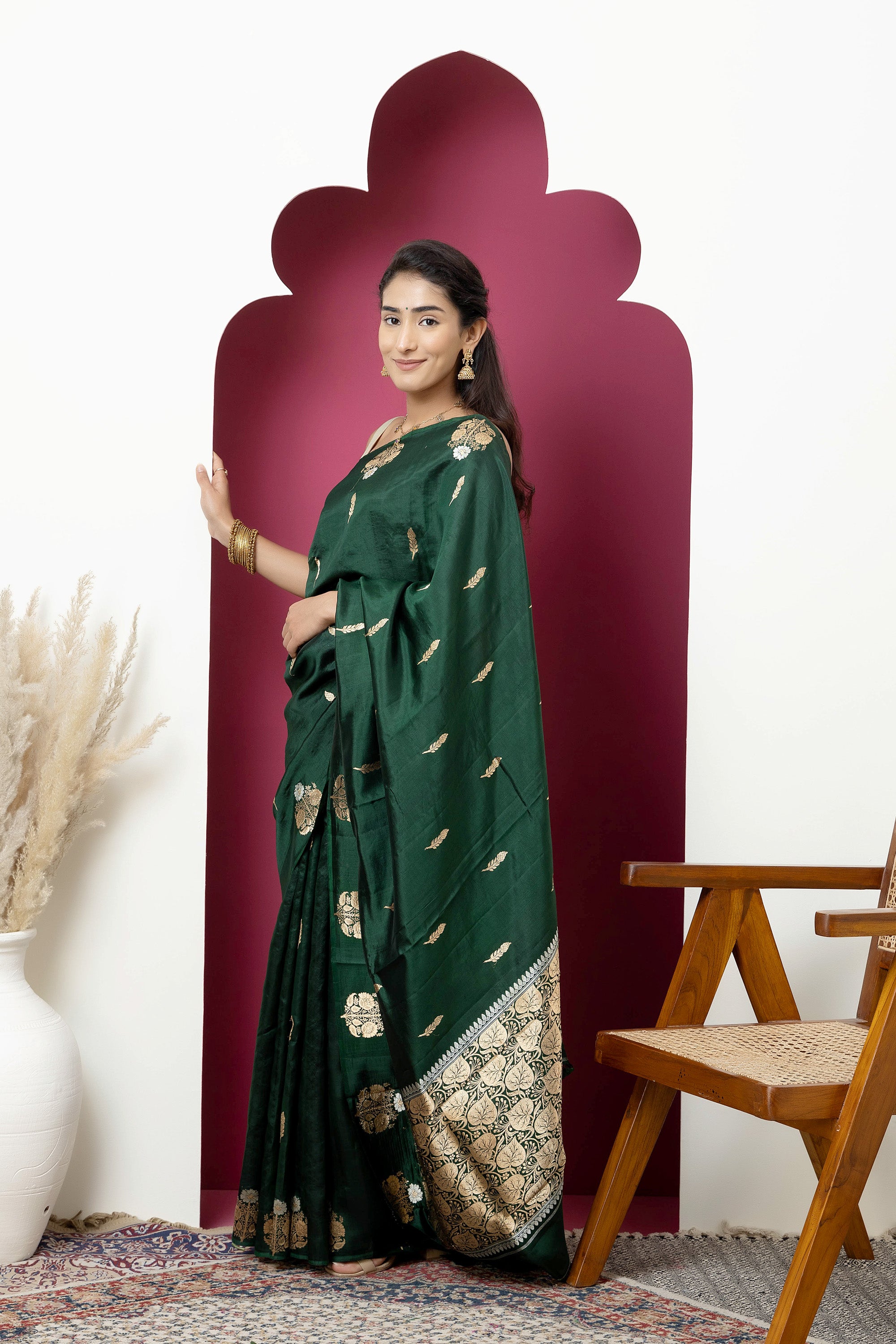 Banarasi Handloom deep bottle green pure silk saree with large bute on the border, bute all over and zari border