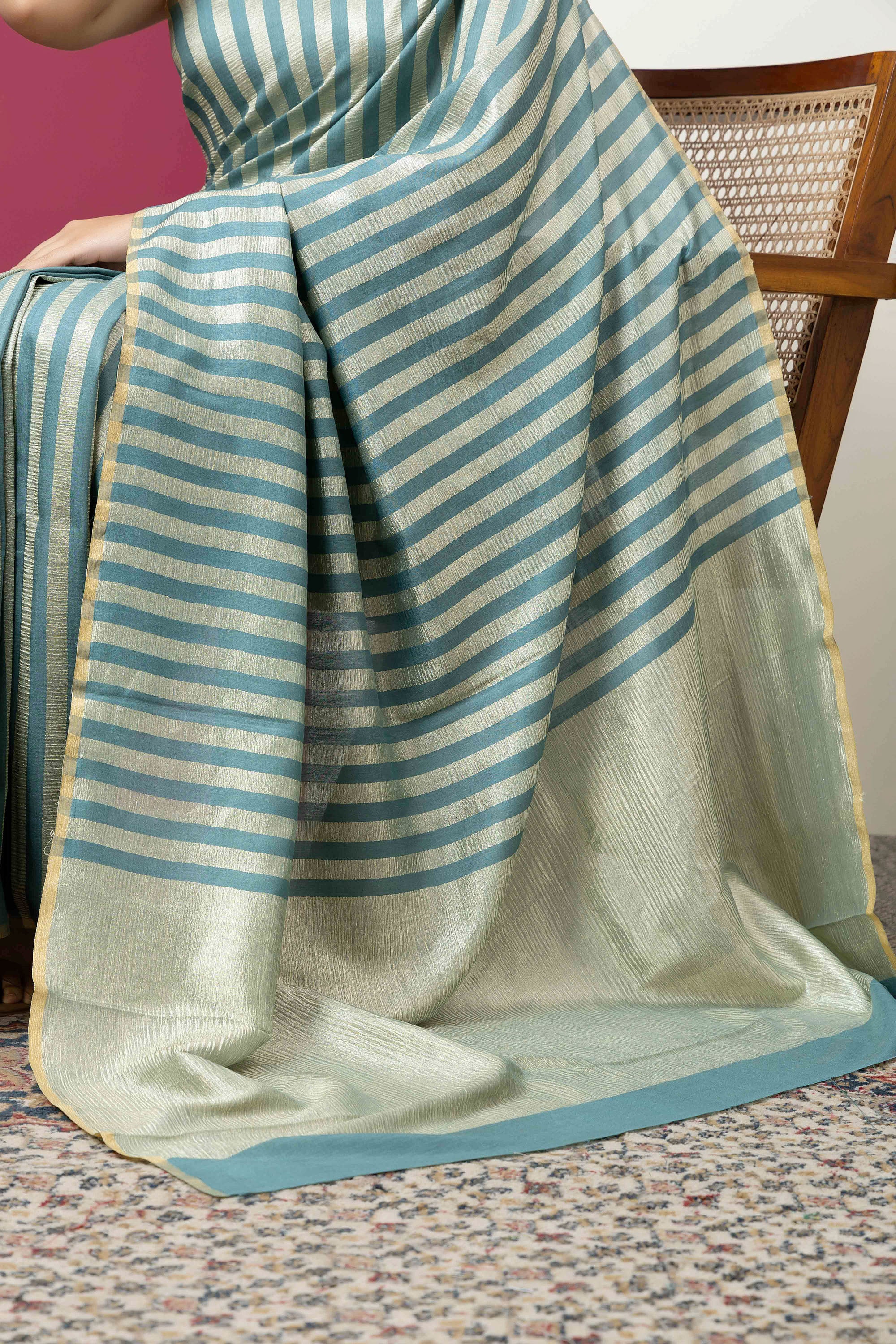 Beautiful Banarasi green pure Muga silk saree with alternate stripes of crinkled tissue and zari pallu