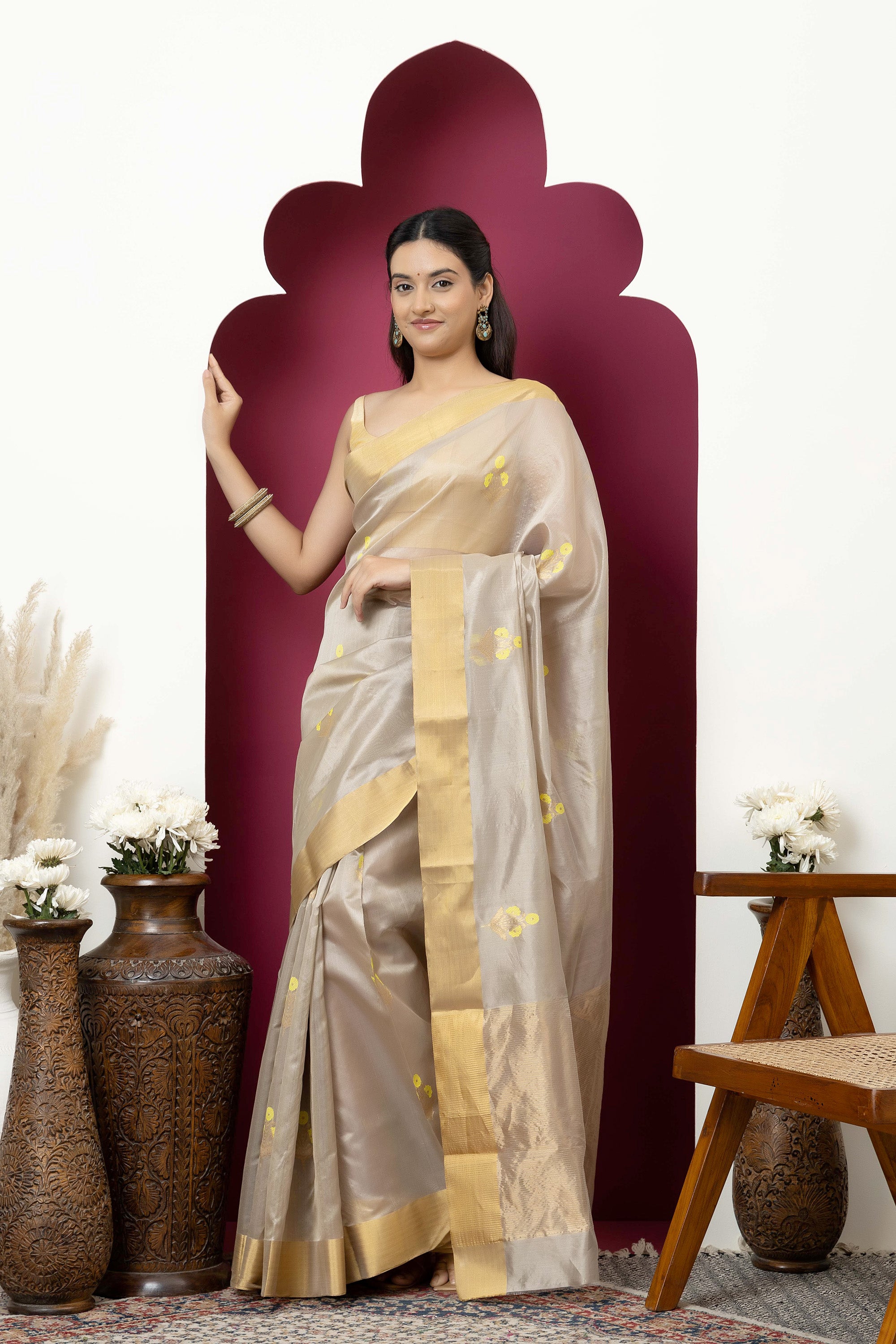 Chanderi handwoven pure silk beige saree with all-over golden and yellow weaved Buta design