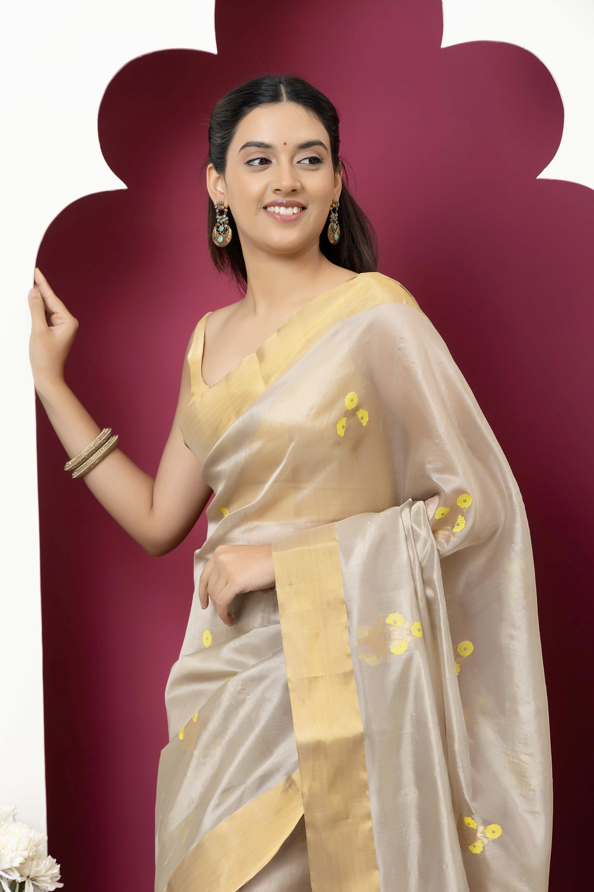 Chanderi handwoven pure silk beige saree with all-over golden and yellow weaved Buta design