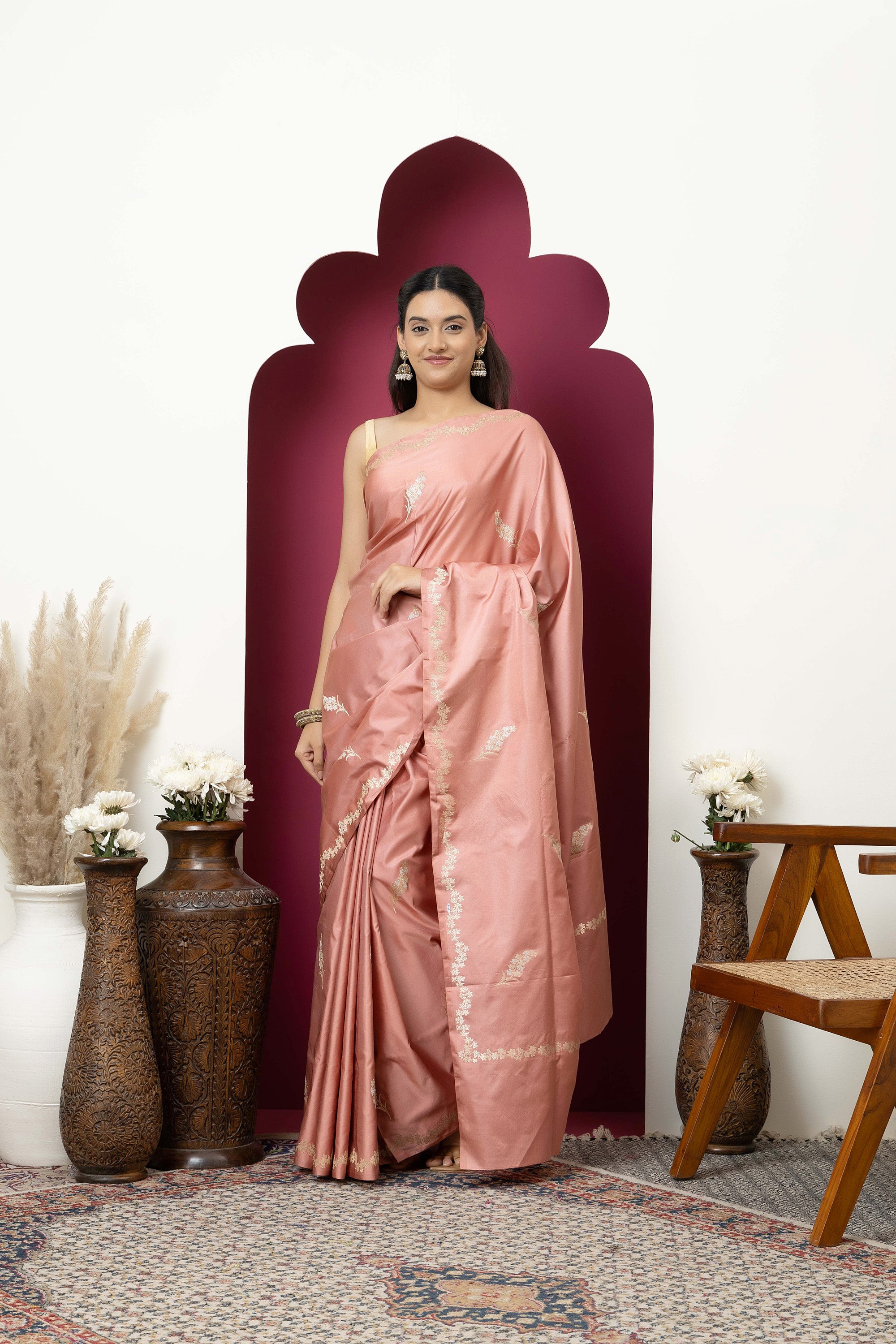 Banarasi Handloom rosewood pink pure Mashru Katan silk saree with running vine adorned with flowers on the border, small bute all over and zari border