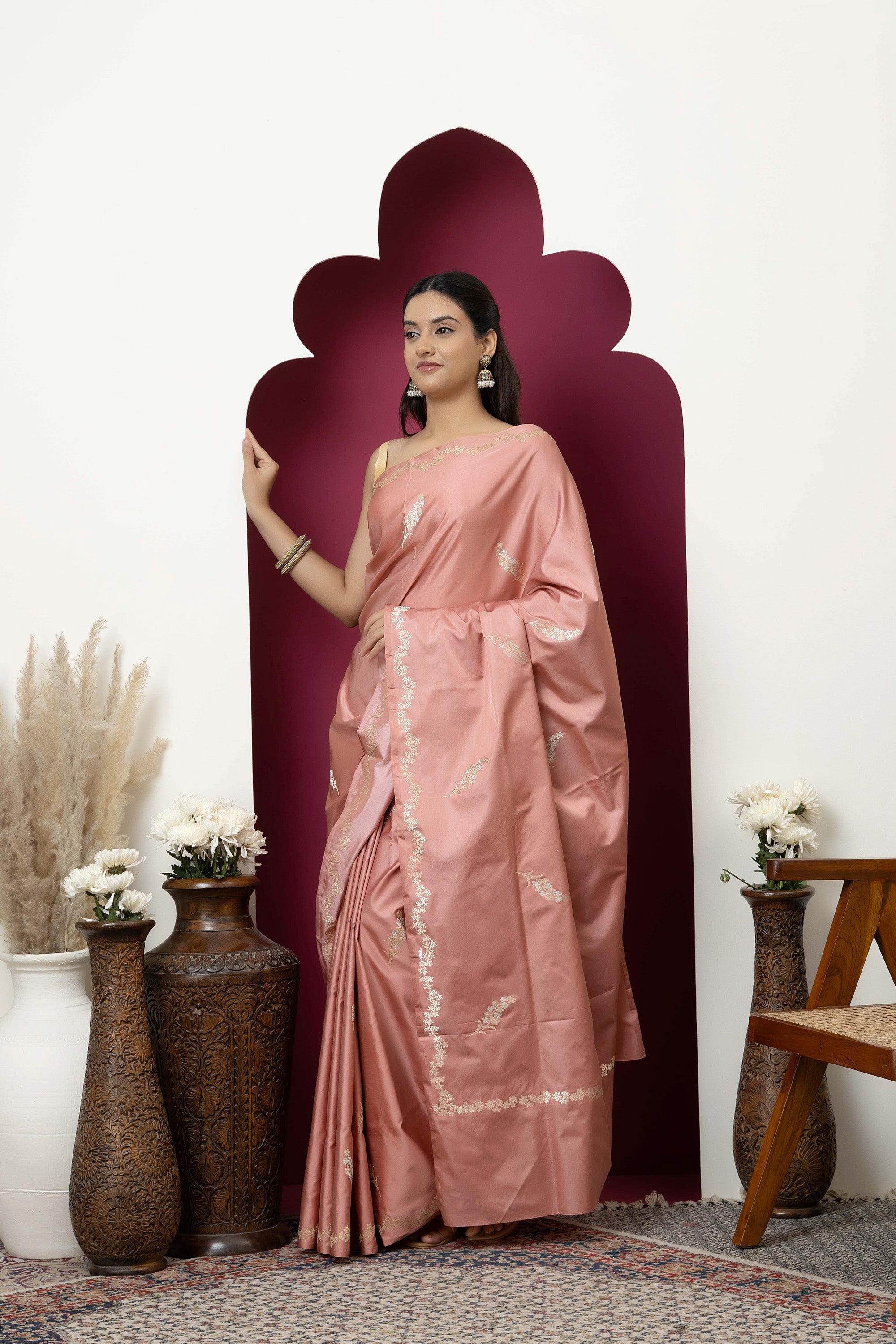 Banarasi Handloom rosewood pink pure Mashru Katan silk saree with running vine adorned with flowers on the border, small bute all over and zari border