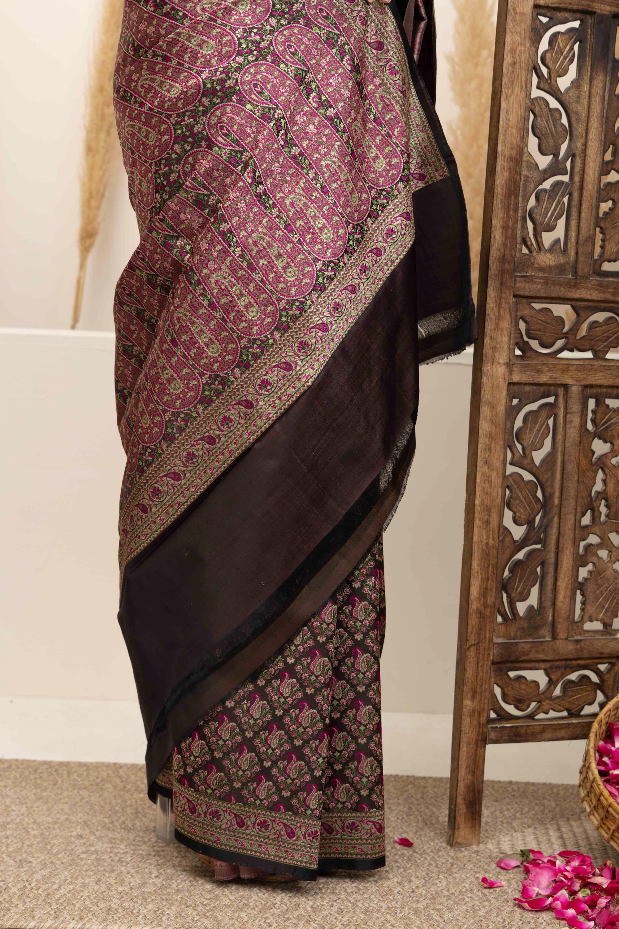 Banarasi pure silk tanchui saree. It’s a rich majenta on brown undertone saree with intricate resham weaving
