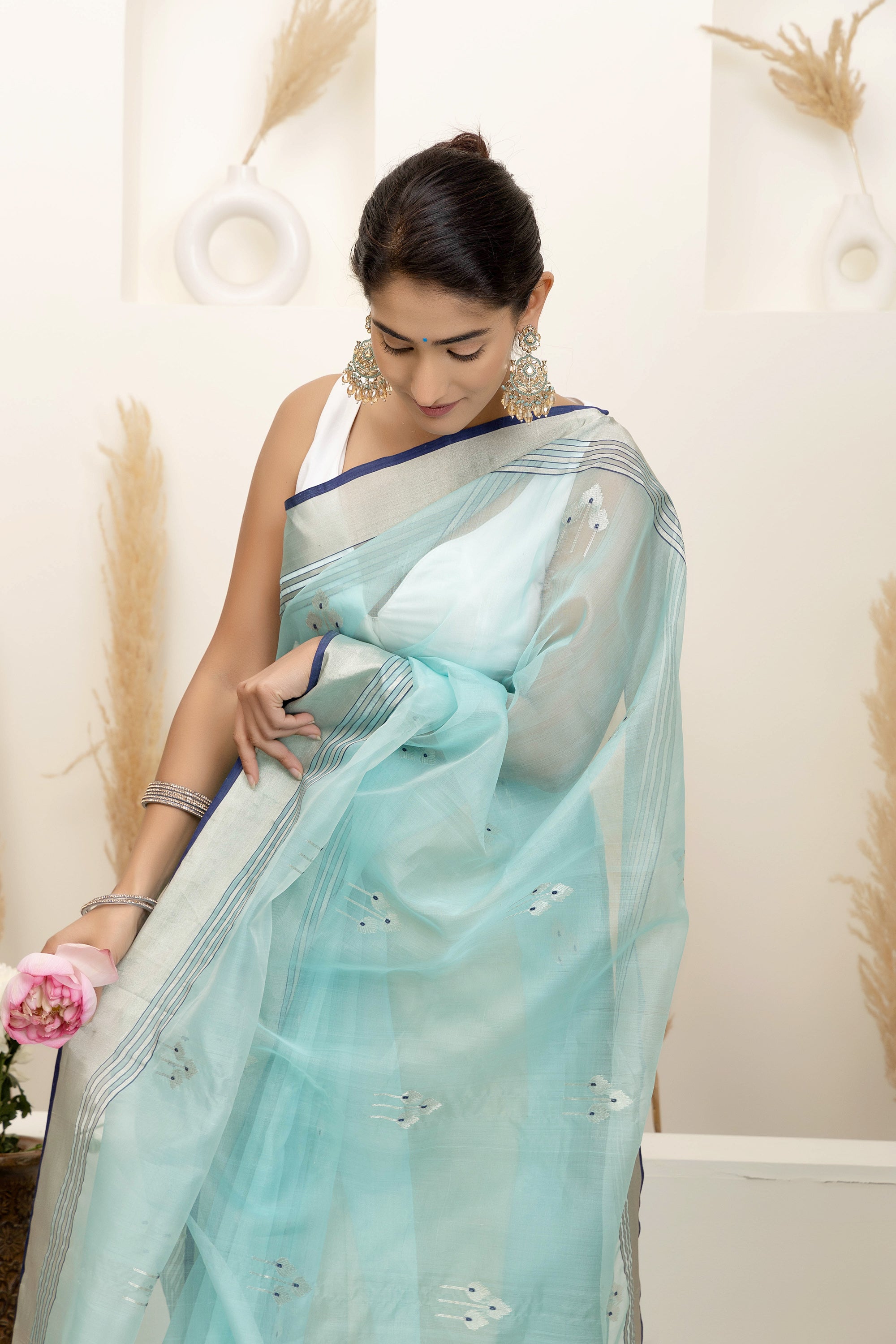 Chanderi handwoven pure silk pastel sea-green saree with large bute design all over, zari, border and pallu