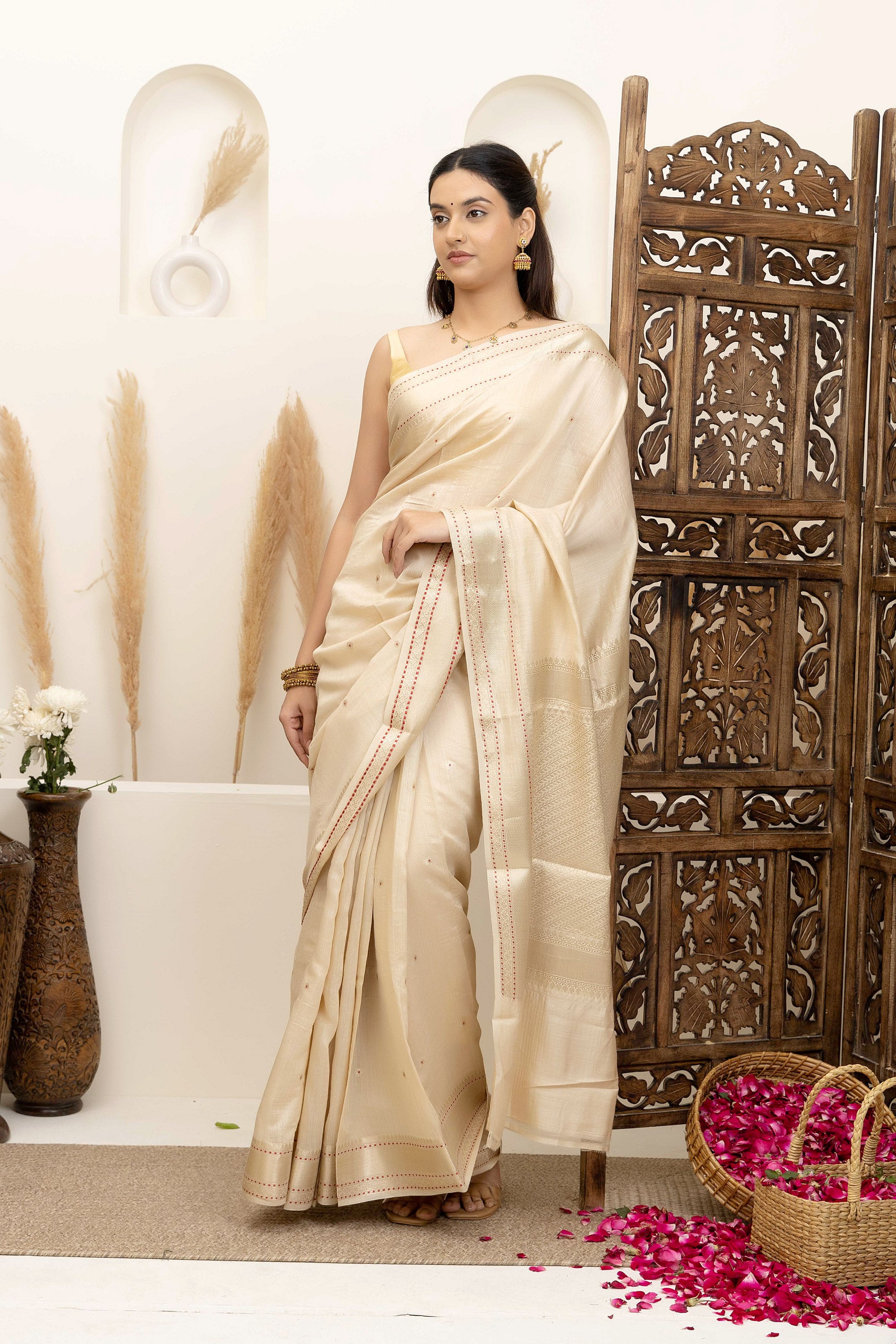Banarasi Pure muga silk saree in natural silk beige colour, with small bute, zari border and pallu