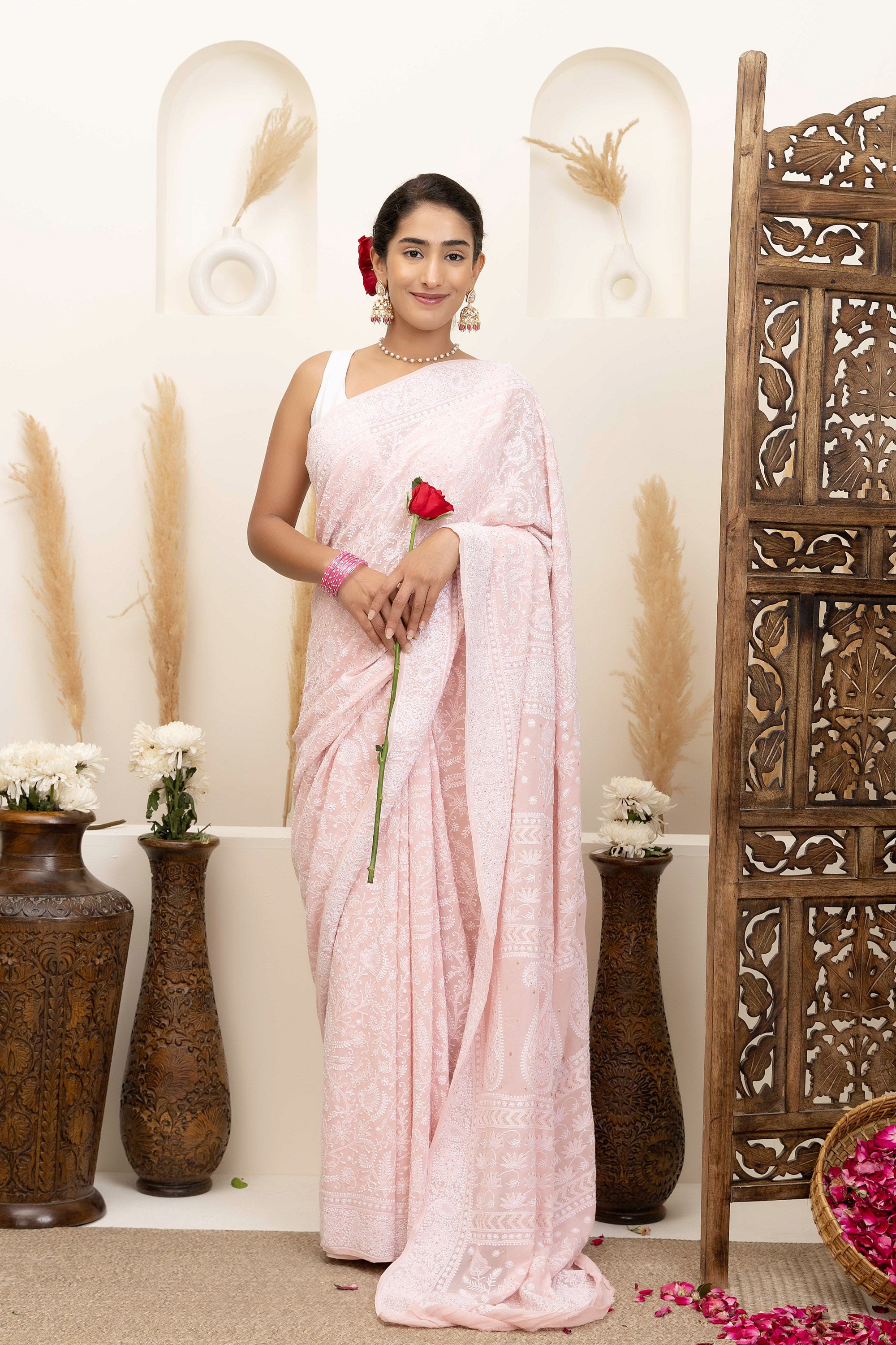 Elegant light pink pure silk georgette saree with fine embroidered Chikankari and mokaish work all over the saree