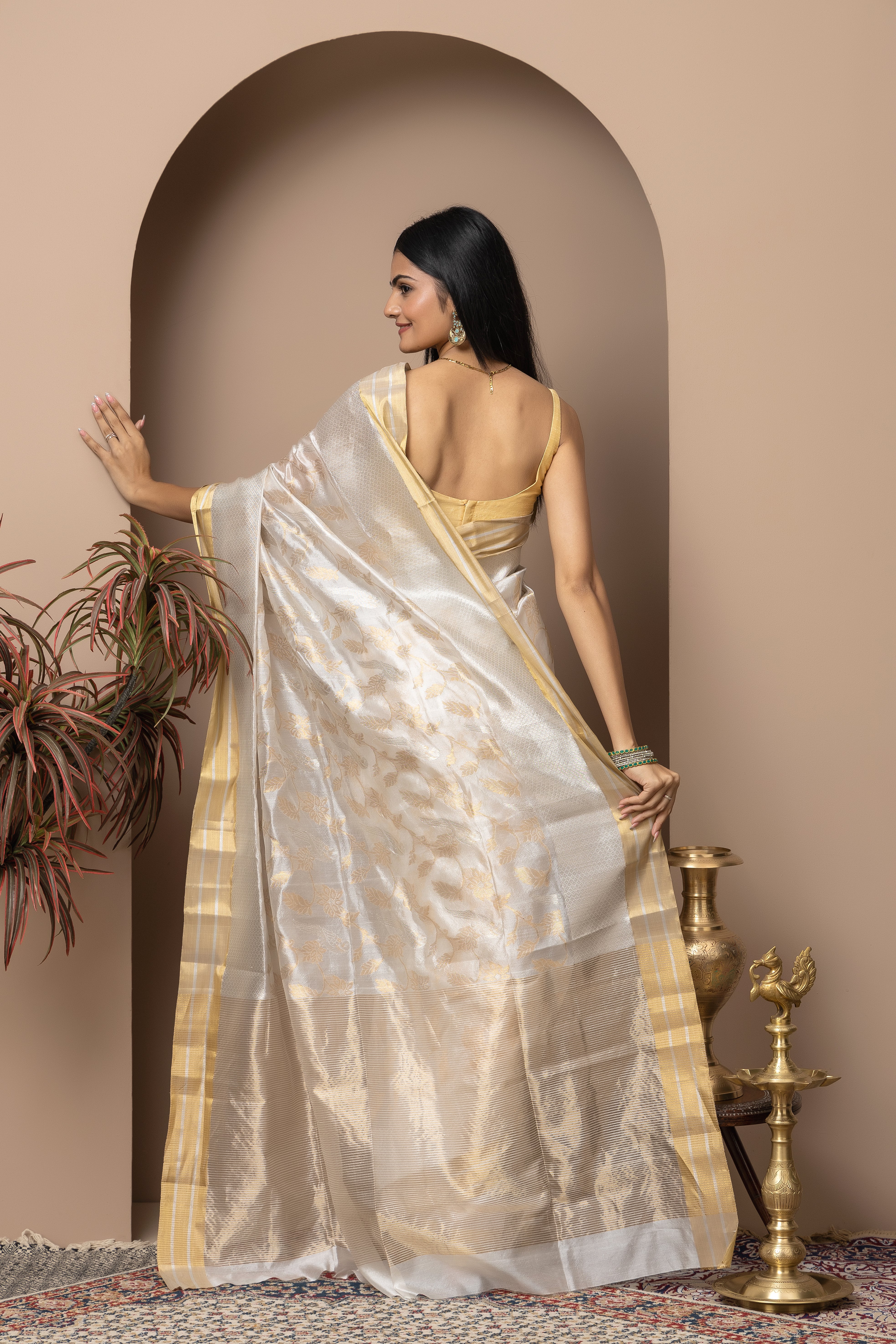 Chanderi handwoven pure pattu silk white saree with all-over golden and silver weaved design