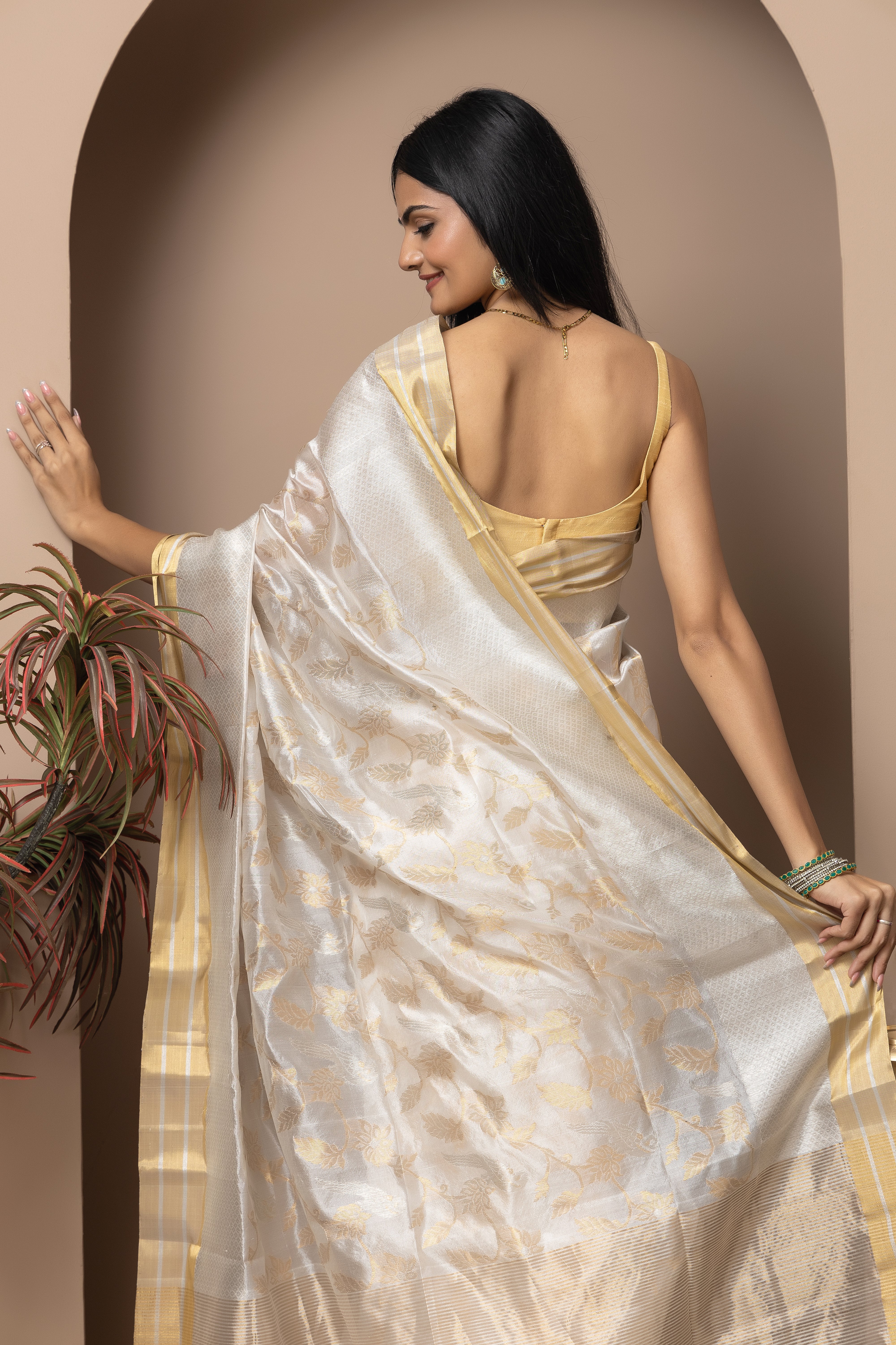 Chanderi handwoven pure pattu silk white saree with all-over golden and silver weaved design