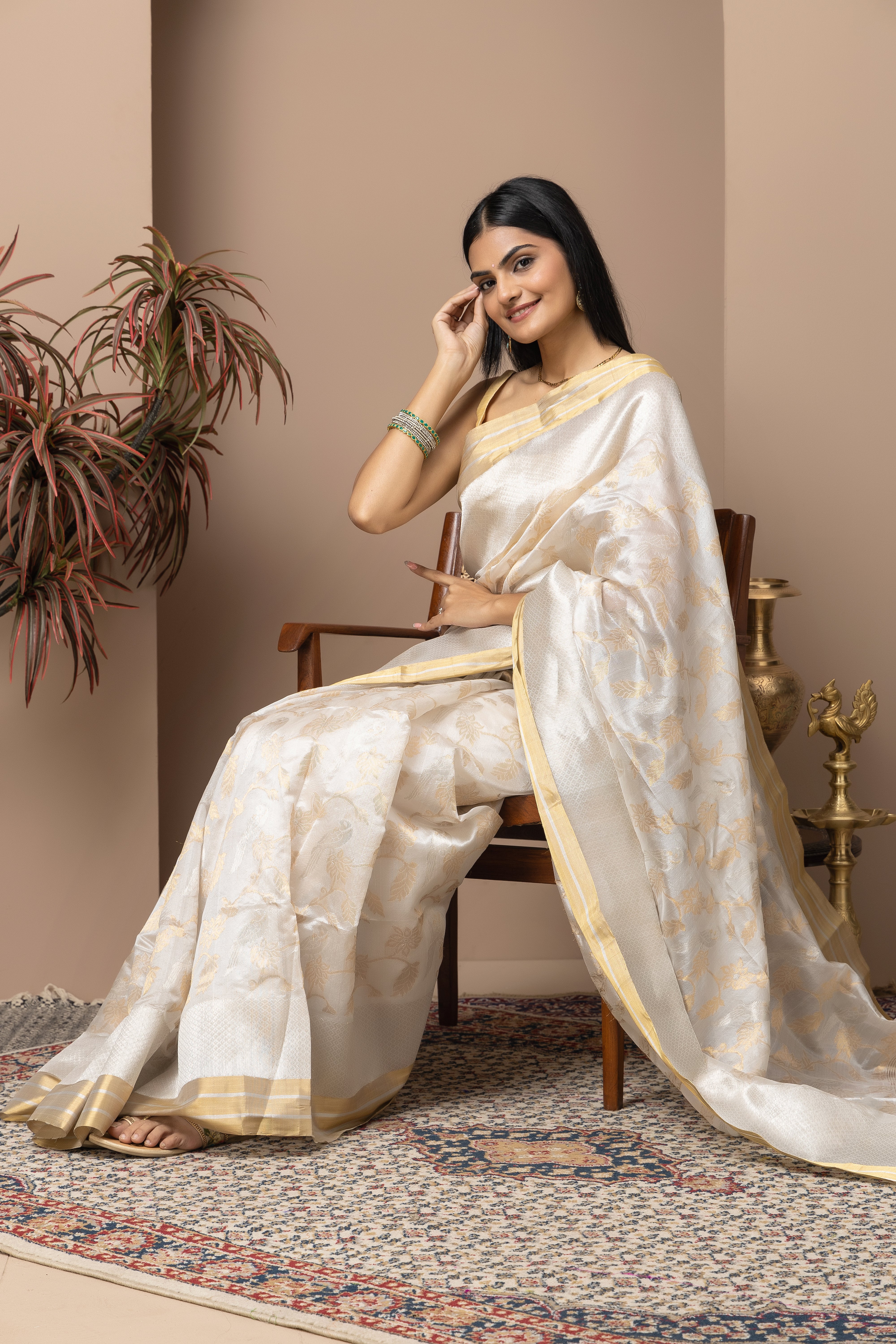 Chanderi handwoven pure pattu silk white saree with all-over golden and silver weaved design