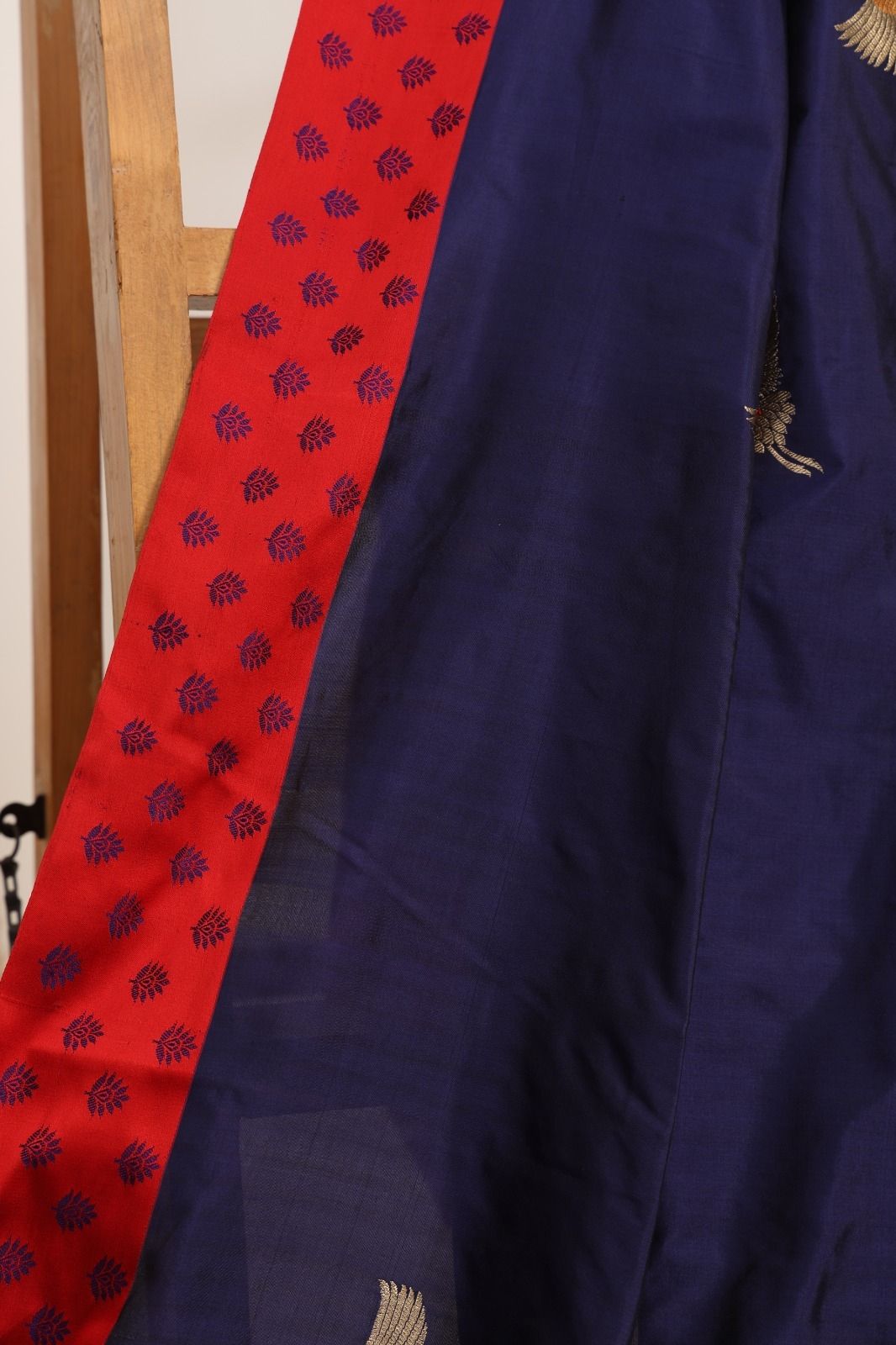 Banarasi pure silk ink blue handloom saree with zari Bute all over and a contrast border and pallu