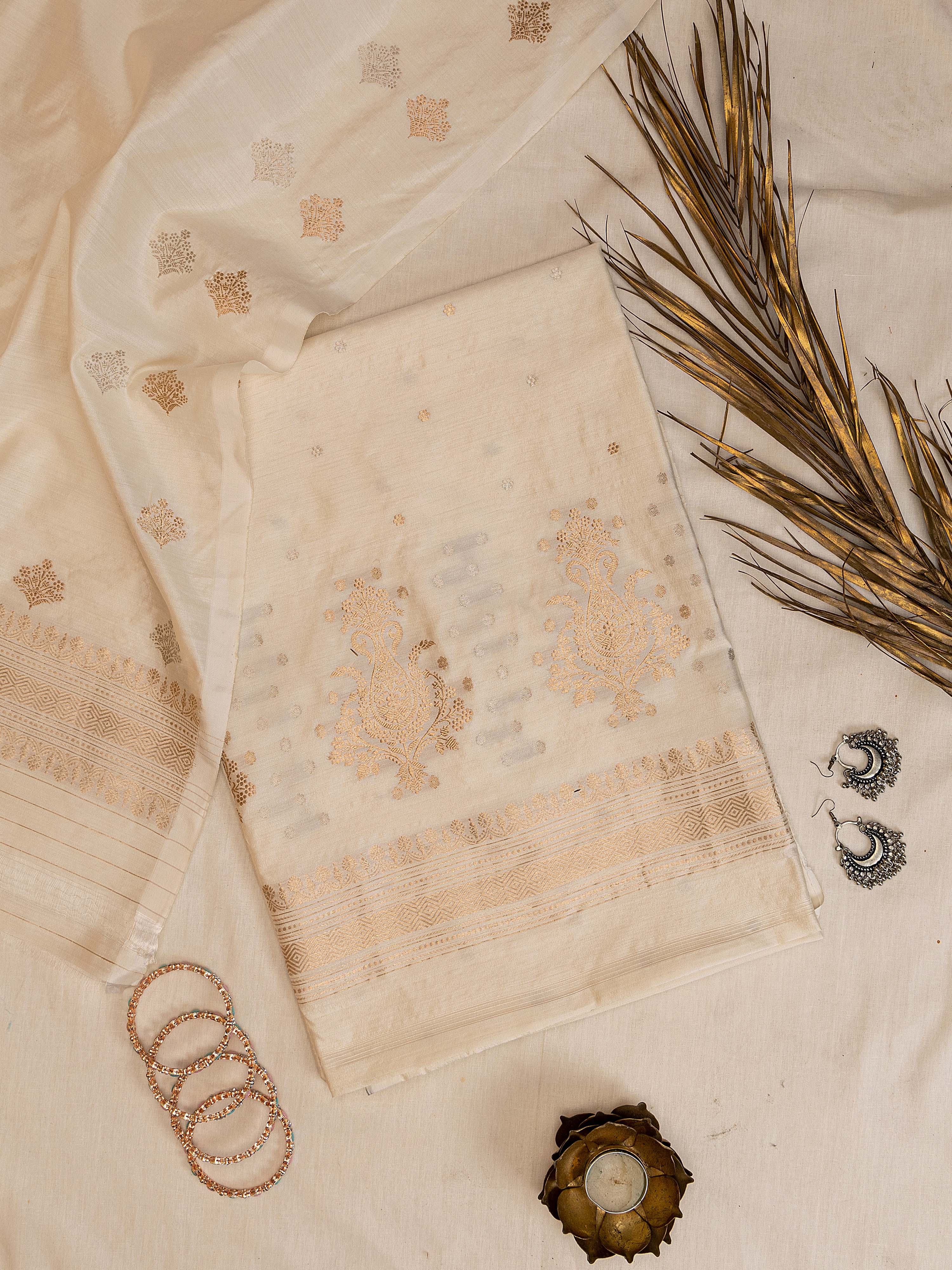 Elegant natural off-white pure silk Banarasi unstitched suit with gold zari weaving
