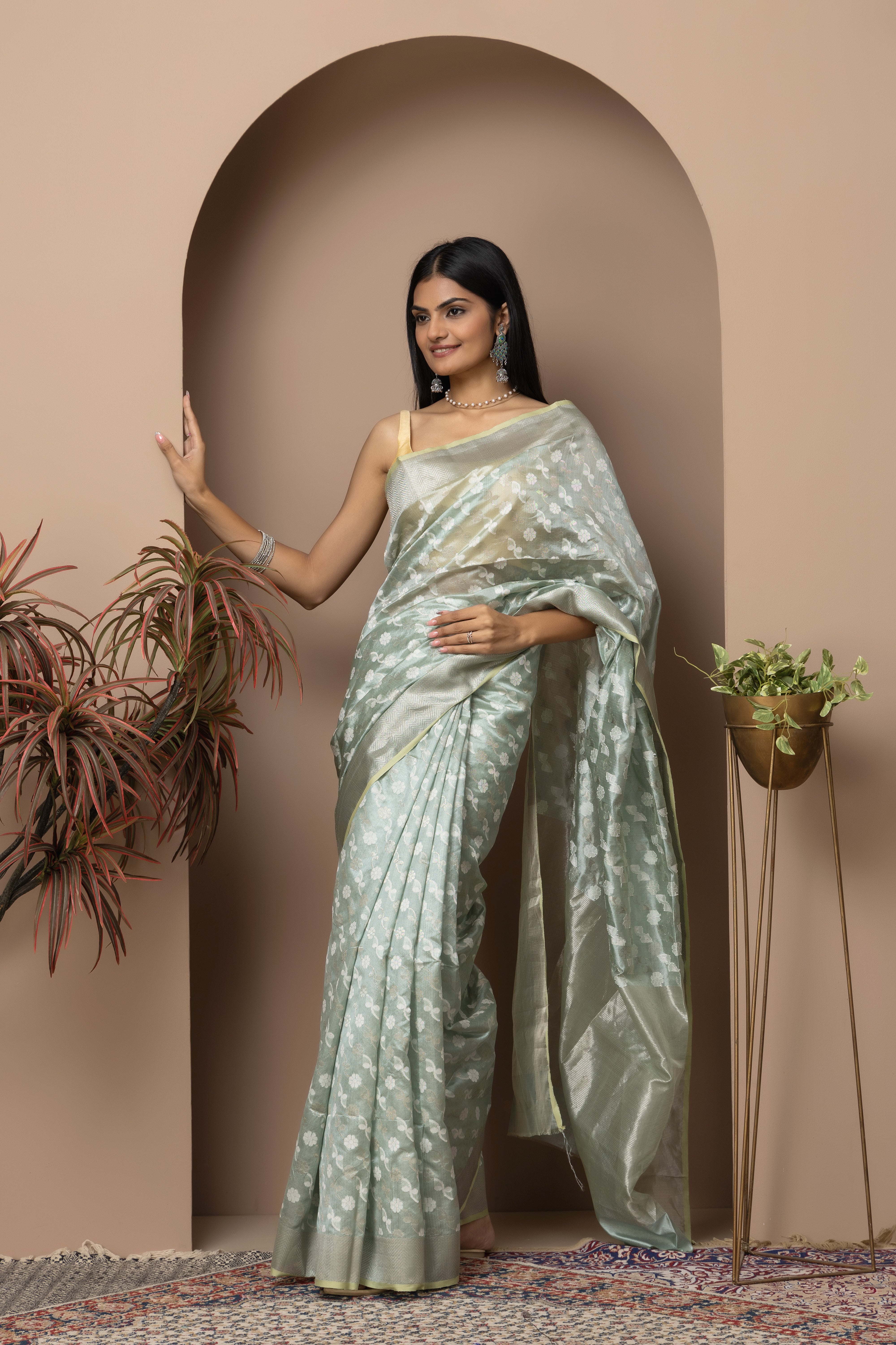 Chanderi handwoven pure pattu silk pastel green saree with all-over golden and silver weaved design