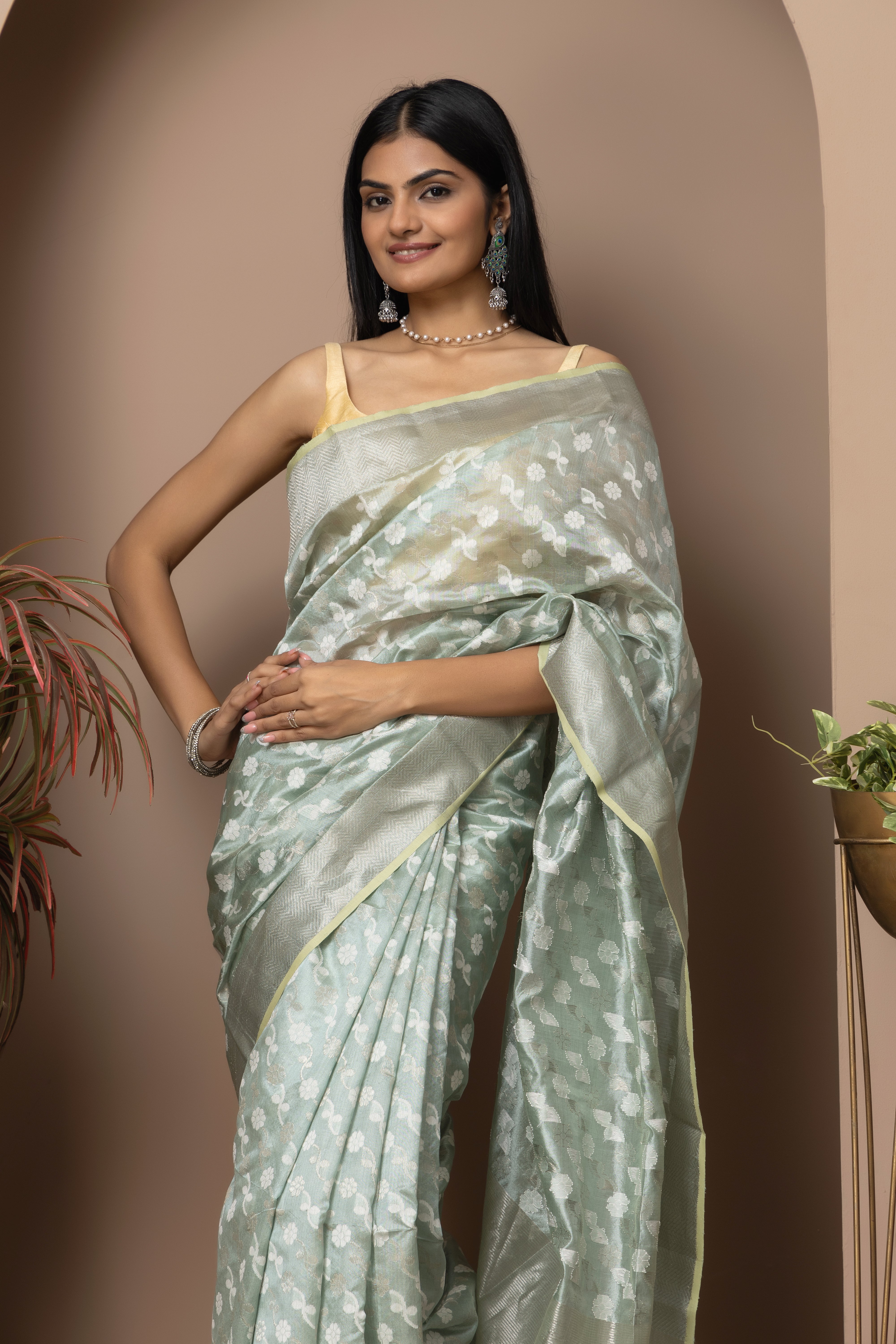 Chanderi handwoven pure pattu silk pastel green saree with all-over golden and silver weaved design