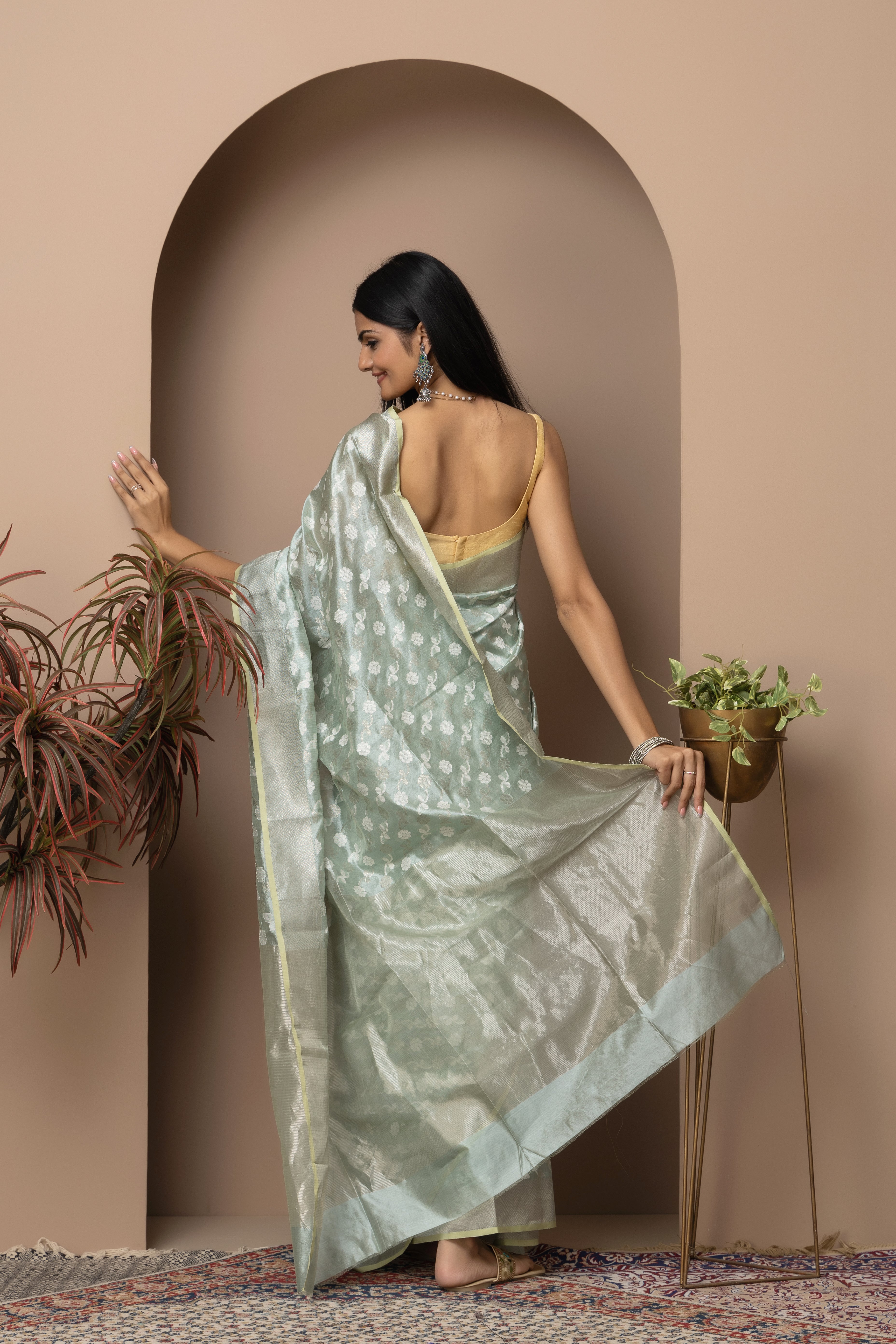 Chanderi handwoven pure pattu silk pastel green saree with all-over golden and silver weaved design