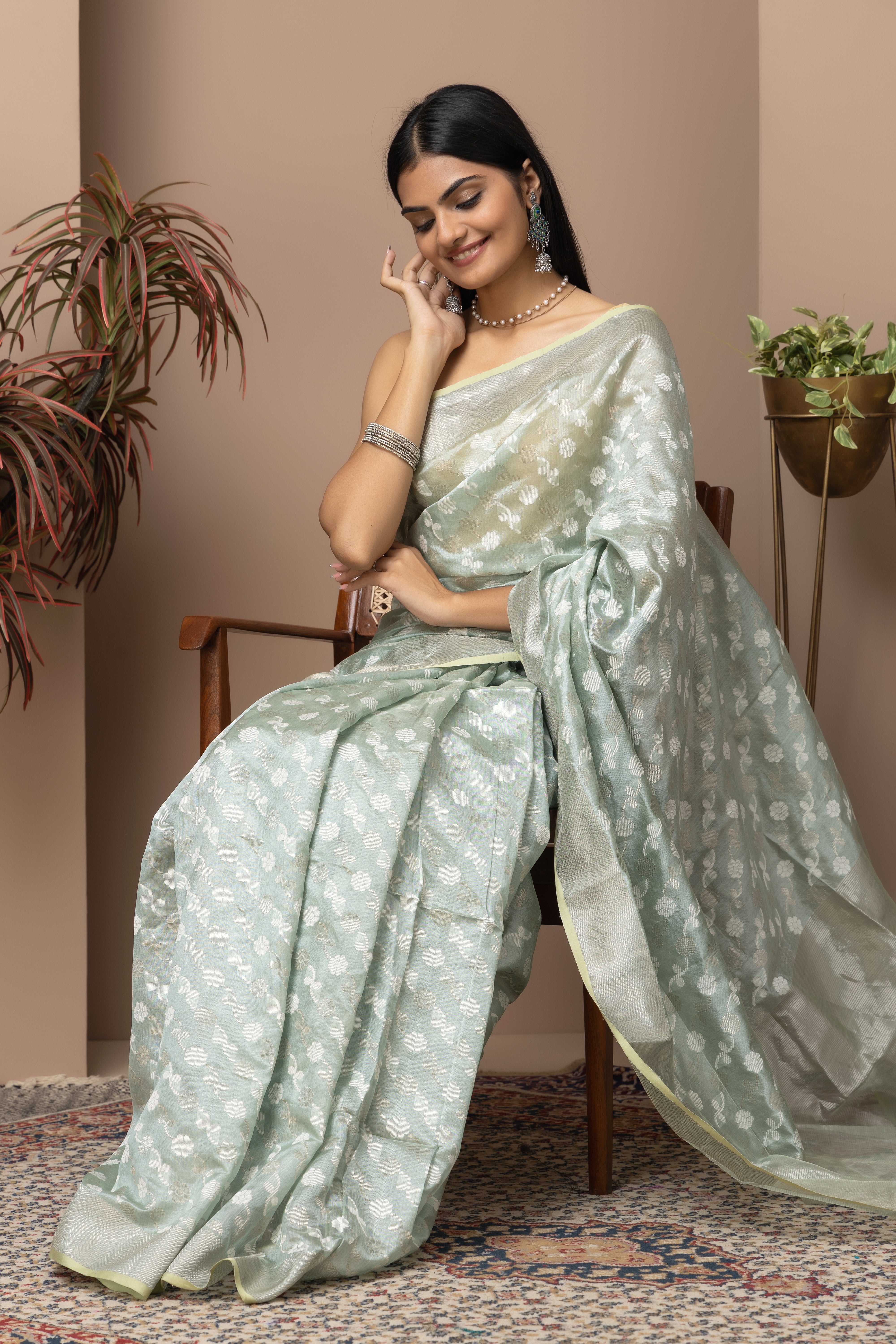 Chanderi handwoven pure pattu silk pastel green saree with all-over golden and silver weaved design