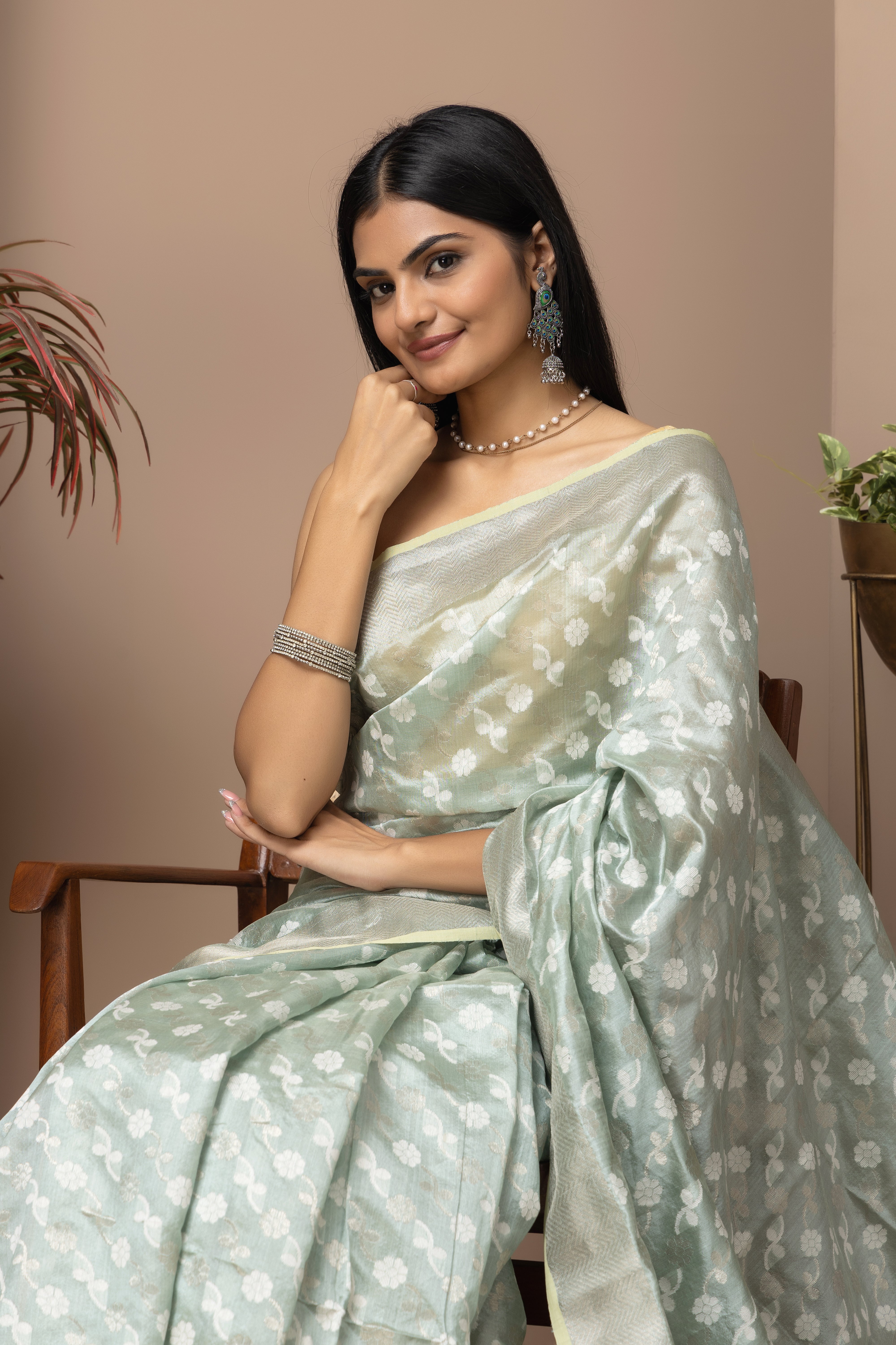 Chanderi handwoven pure pattu silk pastel green saree with all-over golden and silver weaved design
