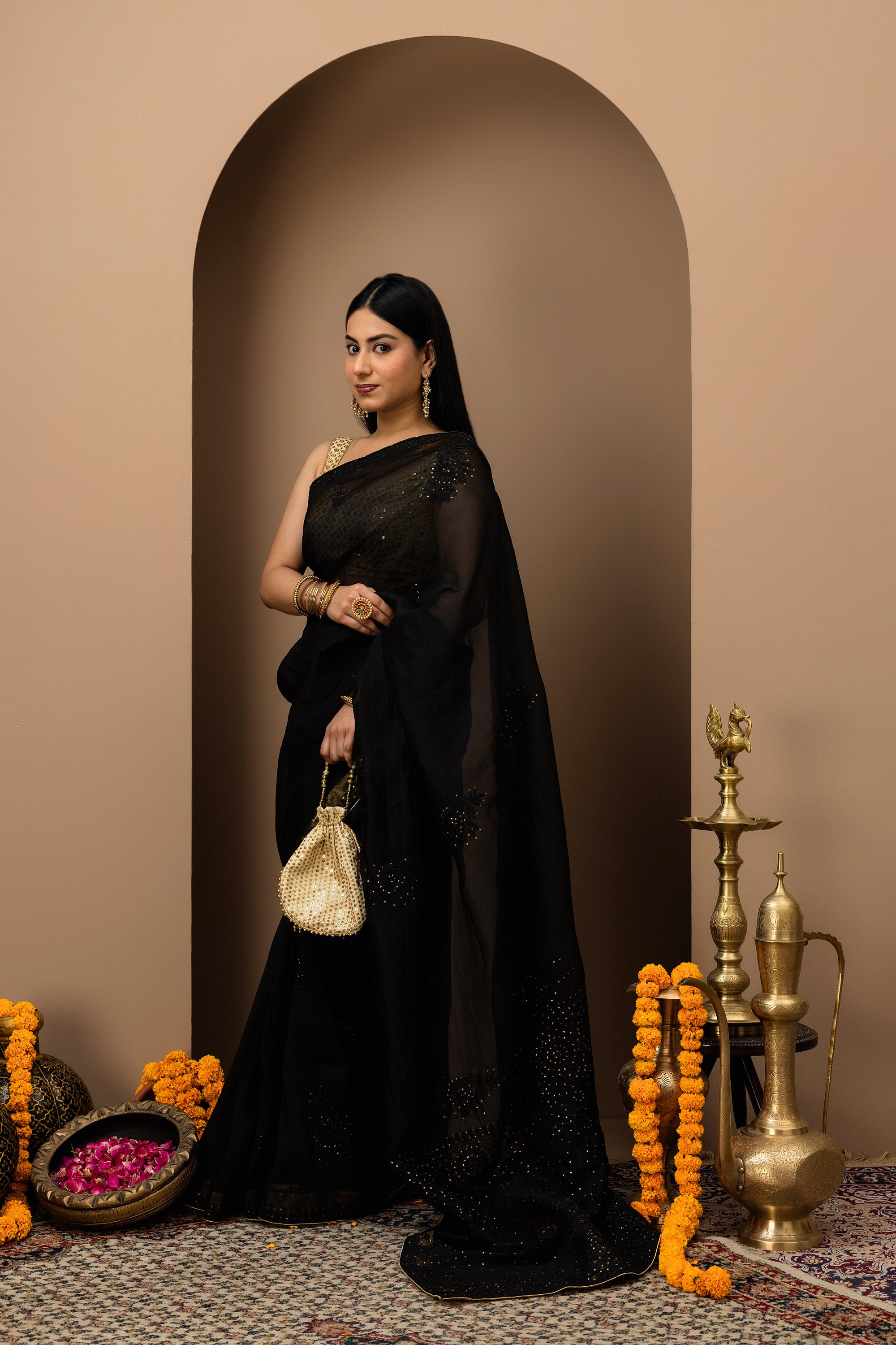 Black, pure organza silk, hand embroidered Chikankari with mukaish work saree