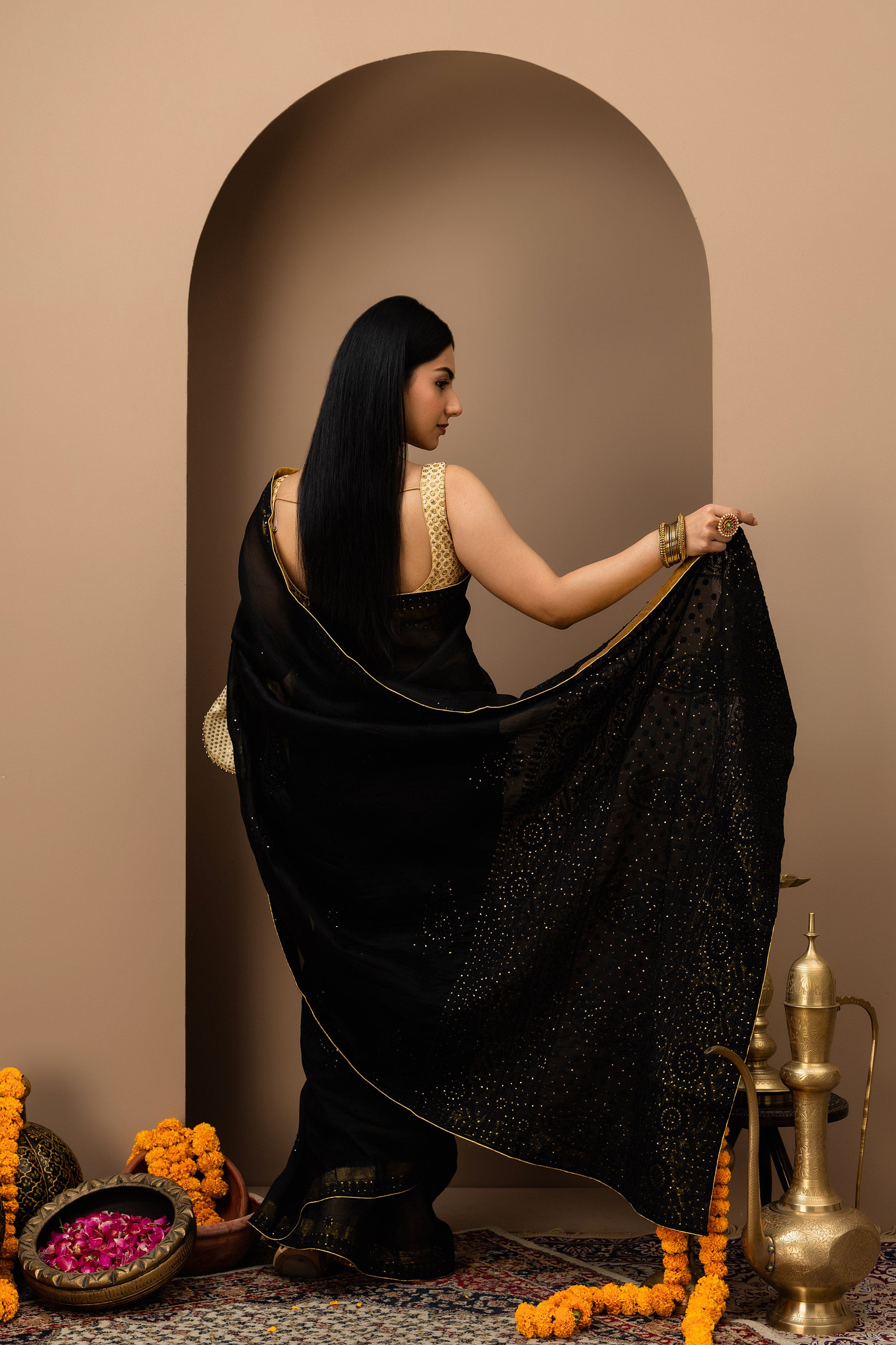 Black, pure organza silk, hand embroidered Chikankari with mukaish work saree