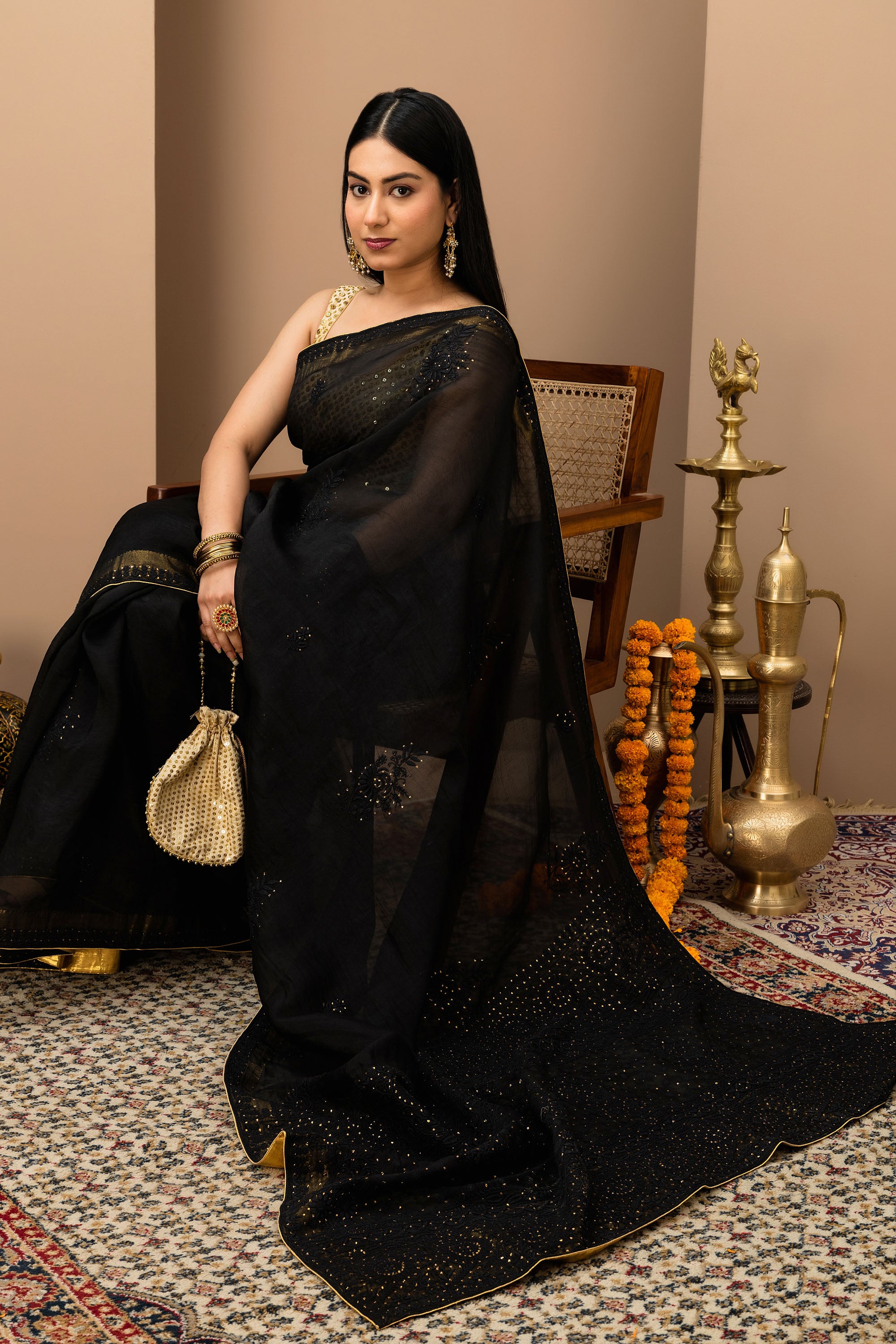 Black, pure organza silk, hand embroidered Chikankari with mukaish work saree