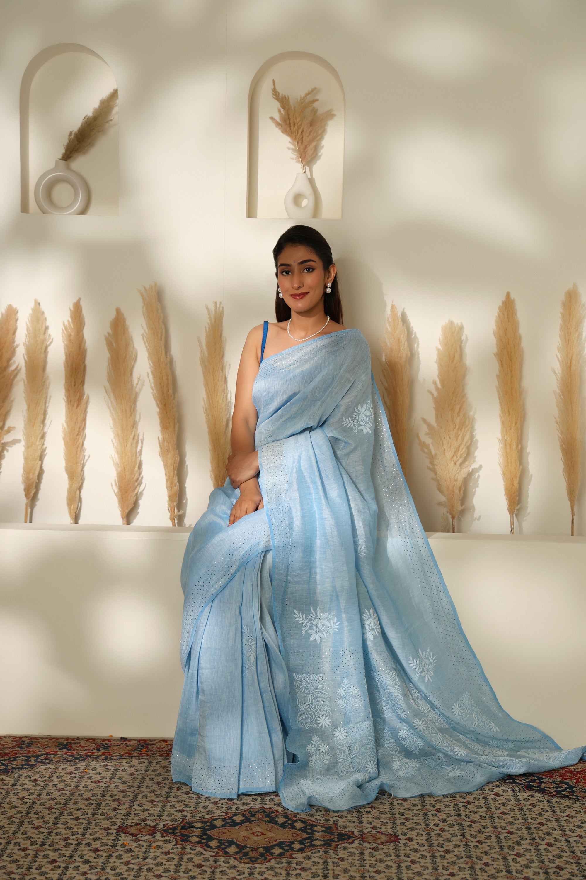 Stunning Powder Blue linen hand embroidered Chikankari saree