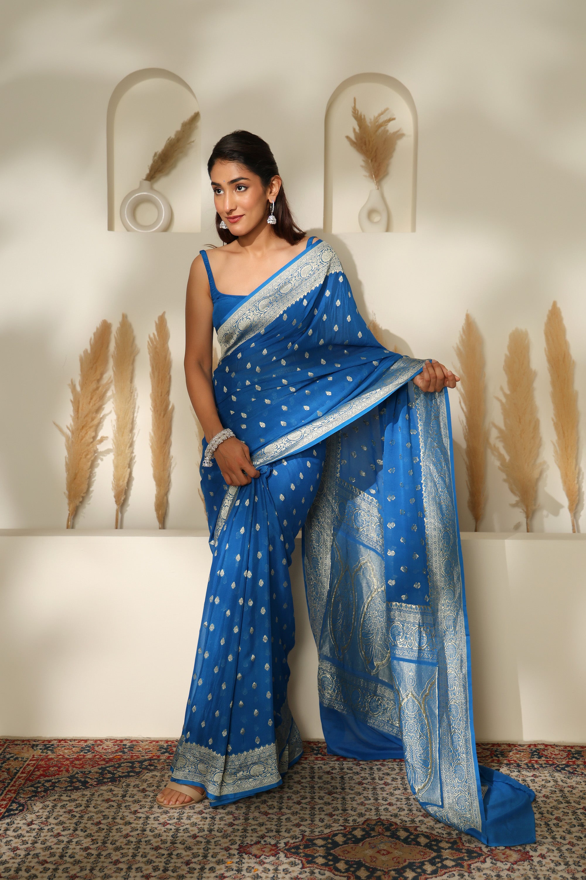 Sapphire Blue handwoven pure khadi georgette saree with silver Zari border