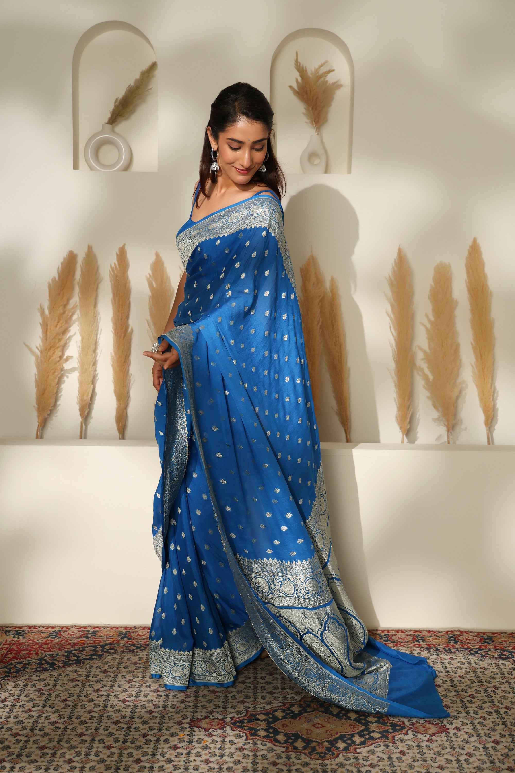 Sapphire Blue handwoven pure khadi georgette saree with silver Zari border