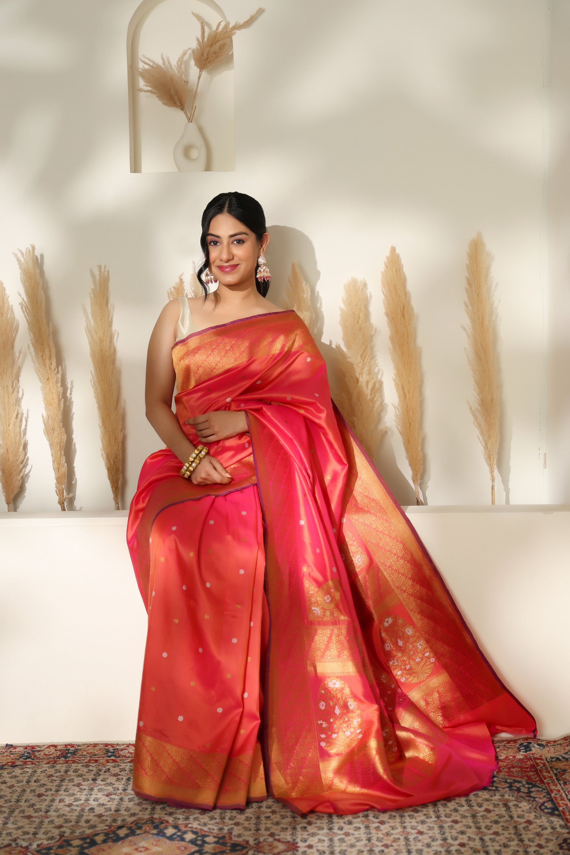 Stunning vibrant coral pink pure katan silk saree