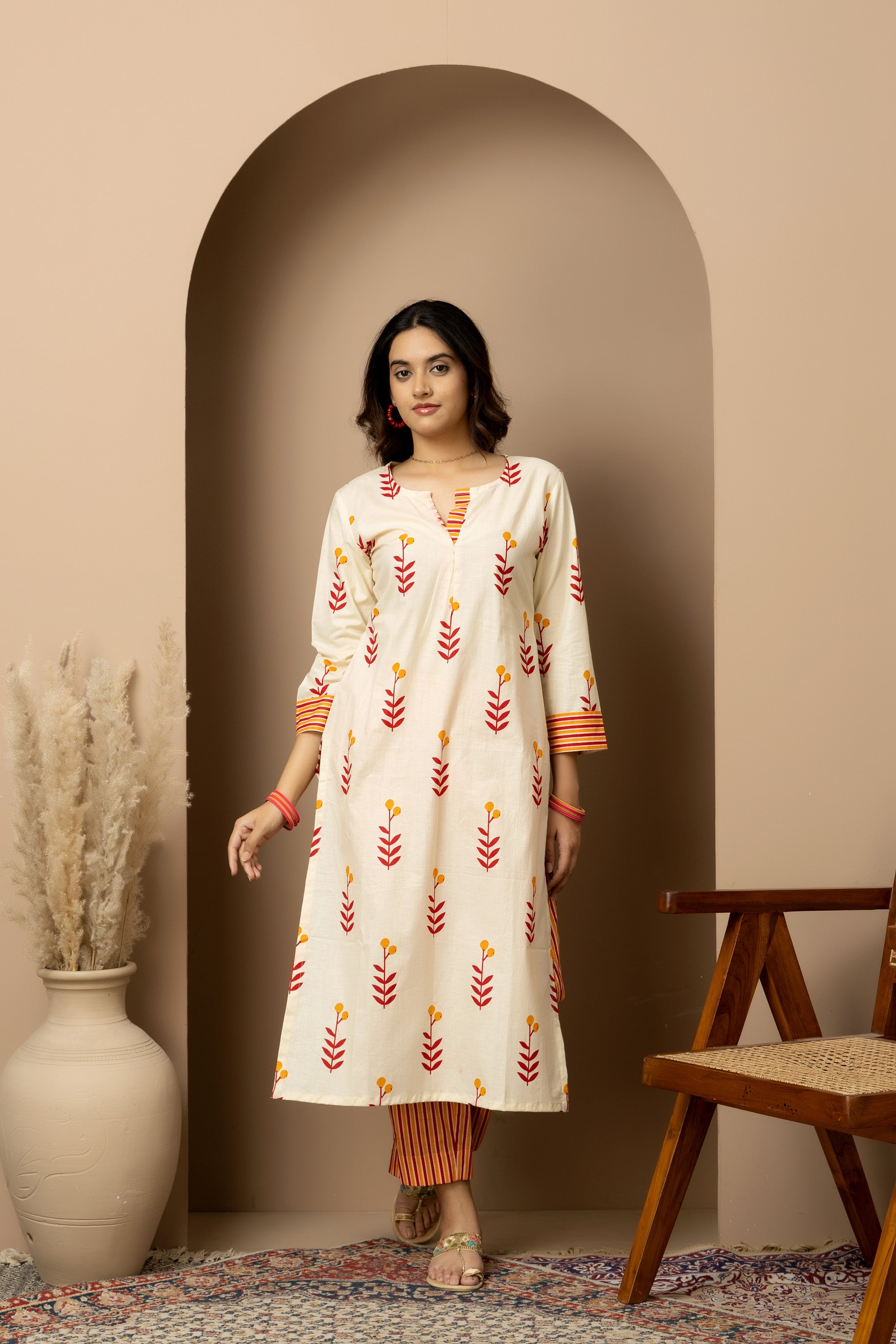 Kesar Bloom - Cotton kurta with pants in cream colour with orange-red floral screen print