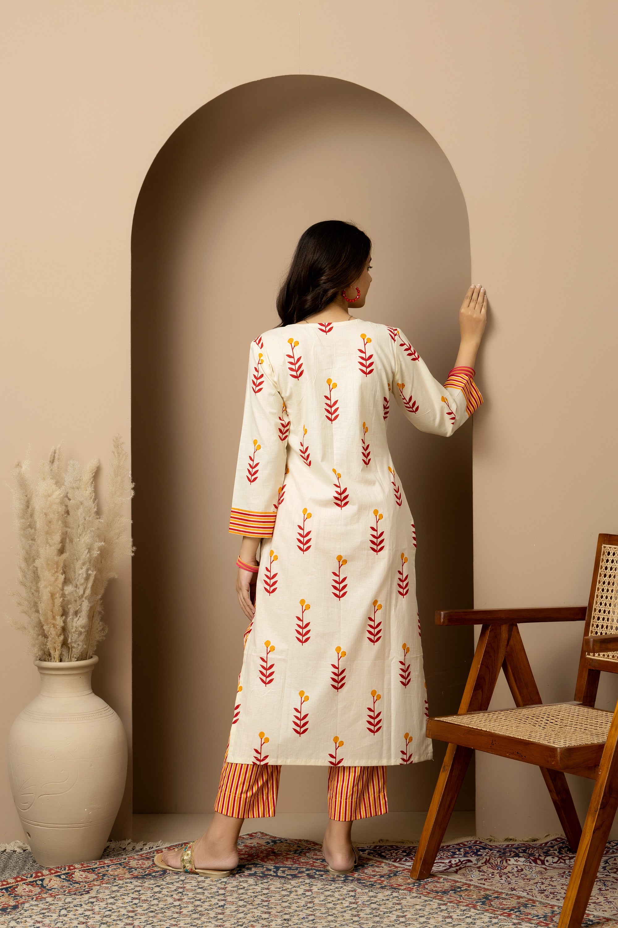 Kesar Bloom - Cotton kurta with pants in cream colour with orange-red floral screen print