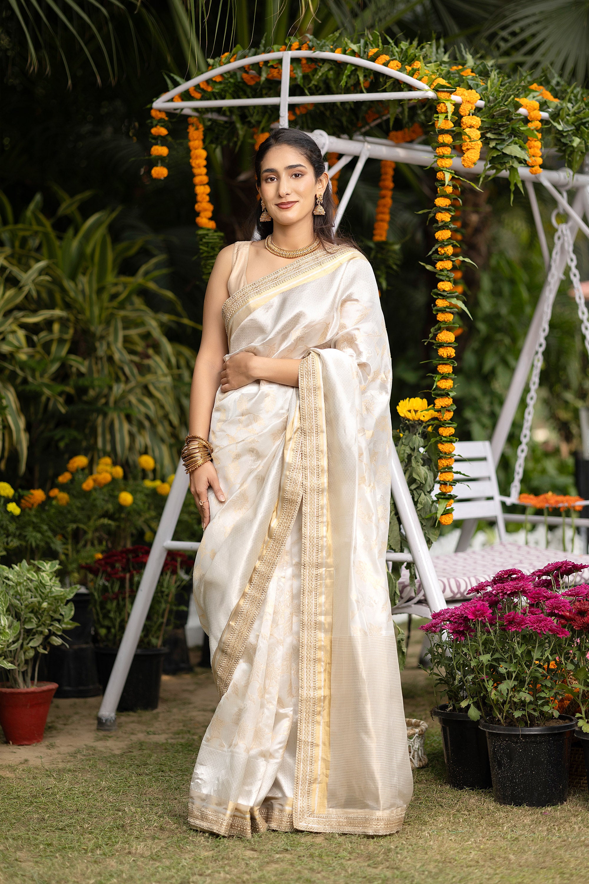 Chanderi handwoven pure silk white saree with all-over golden and silver zari weaved design